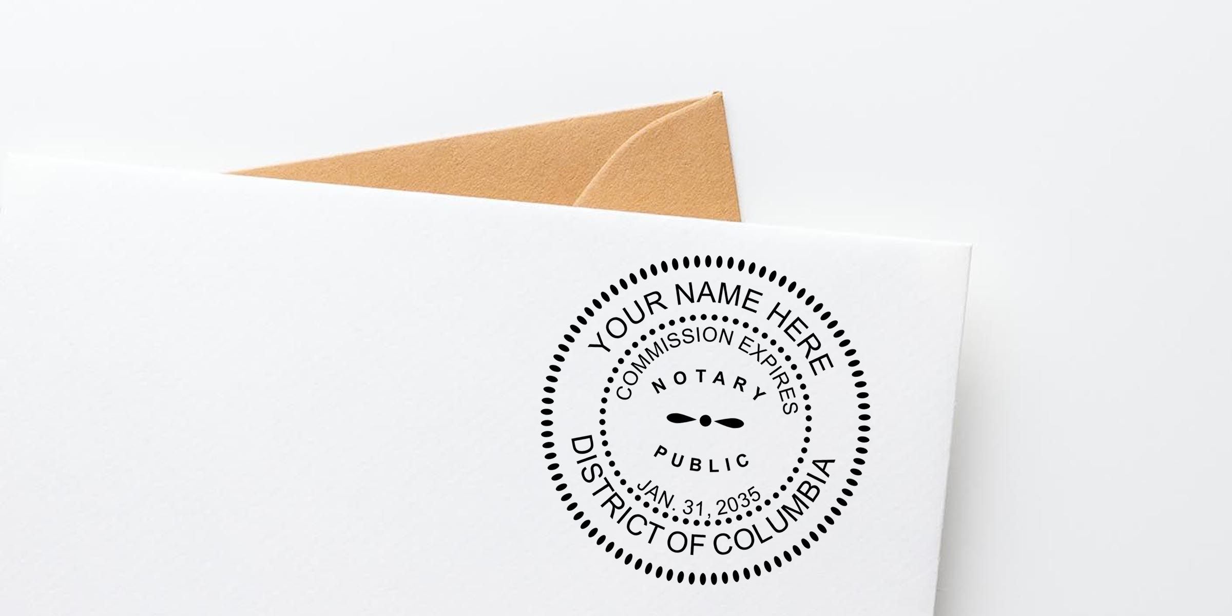 White envelope with tan insert and circular notary public seal reading District of Columbia, commission expires Jan. 31, 2035.
