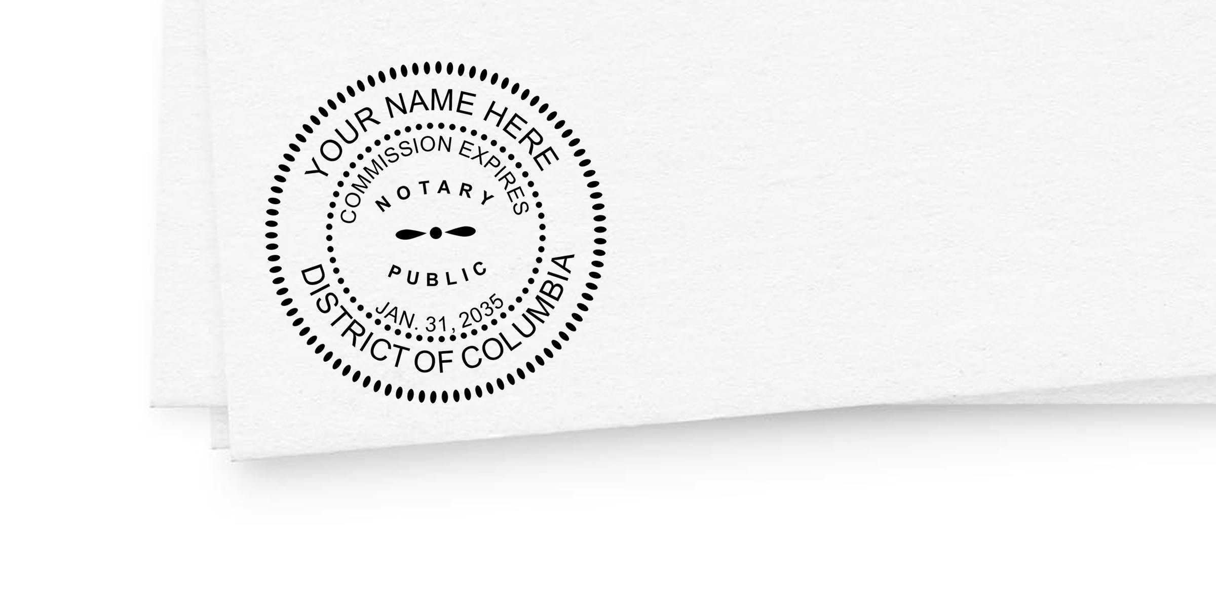 Notary public seal stamp on paper with District of Columbia wording, commission expires Jan. 31, 2035, and placeholder name here text