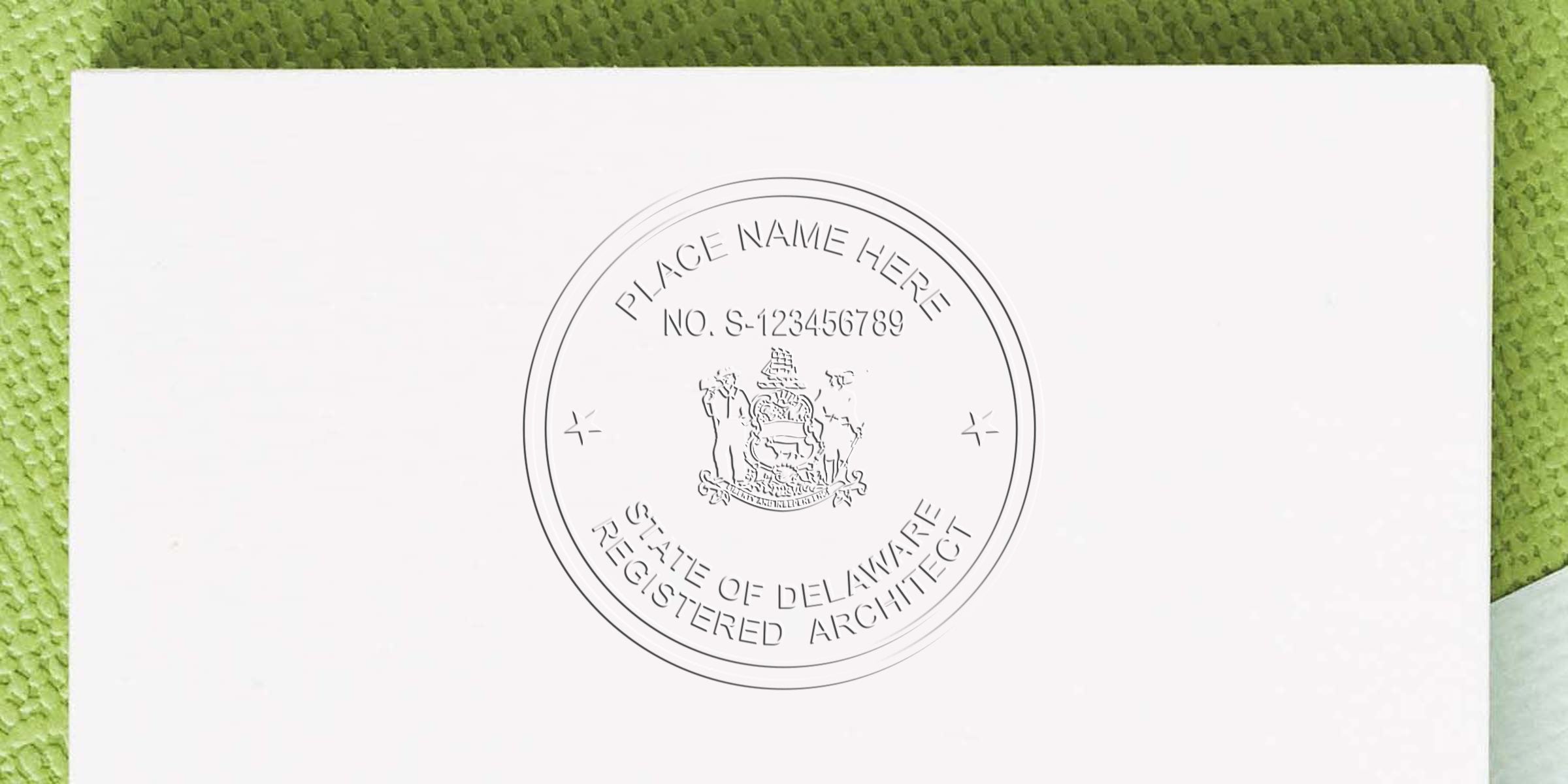 Delaware architect seal embossed on white paper with green textured background, featuring custom Delaware architect seal and stamp.