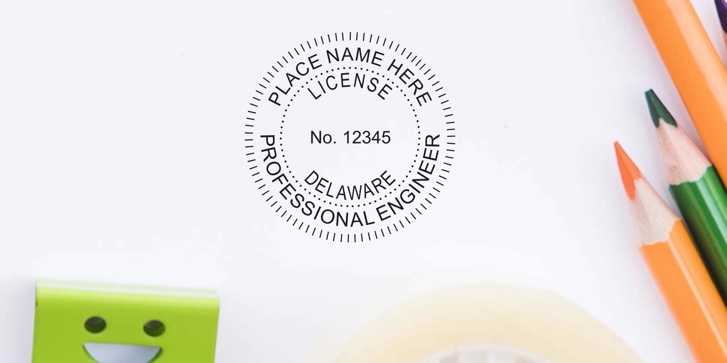 Delaware PE license stamp with stamp size, surrounded by colorful pencils and a green smiling tape dispenser on white, illustrating Delaware PE stamp requirements.