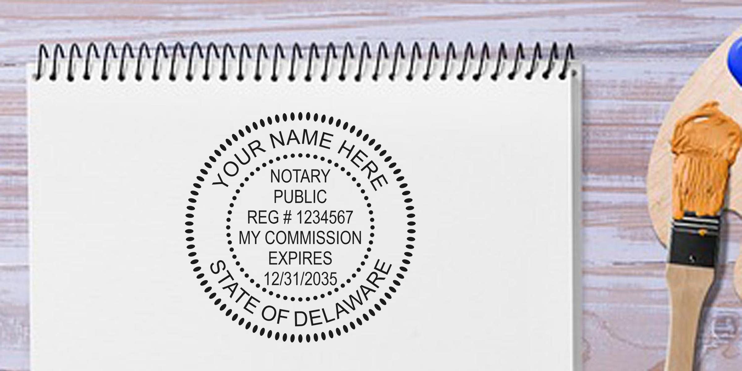 Delaware notary seal stamp on white spiral notebook with commission expiration date, shown as part of a notary seal guide.