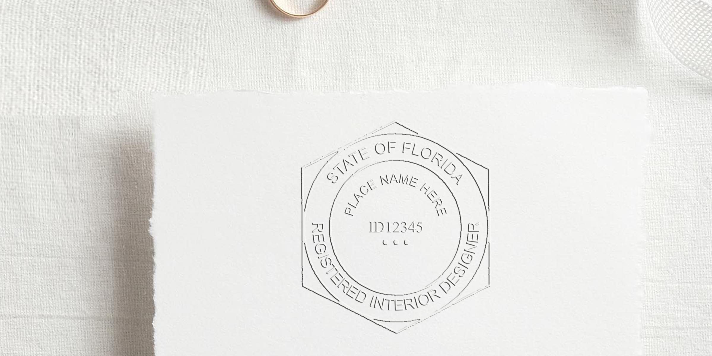 Florida interior designer stamp with Registered Interior Designer seal on white textured paper, representing design compliance for State of Florida certification.