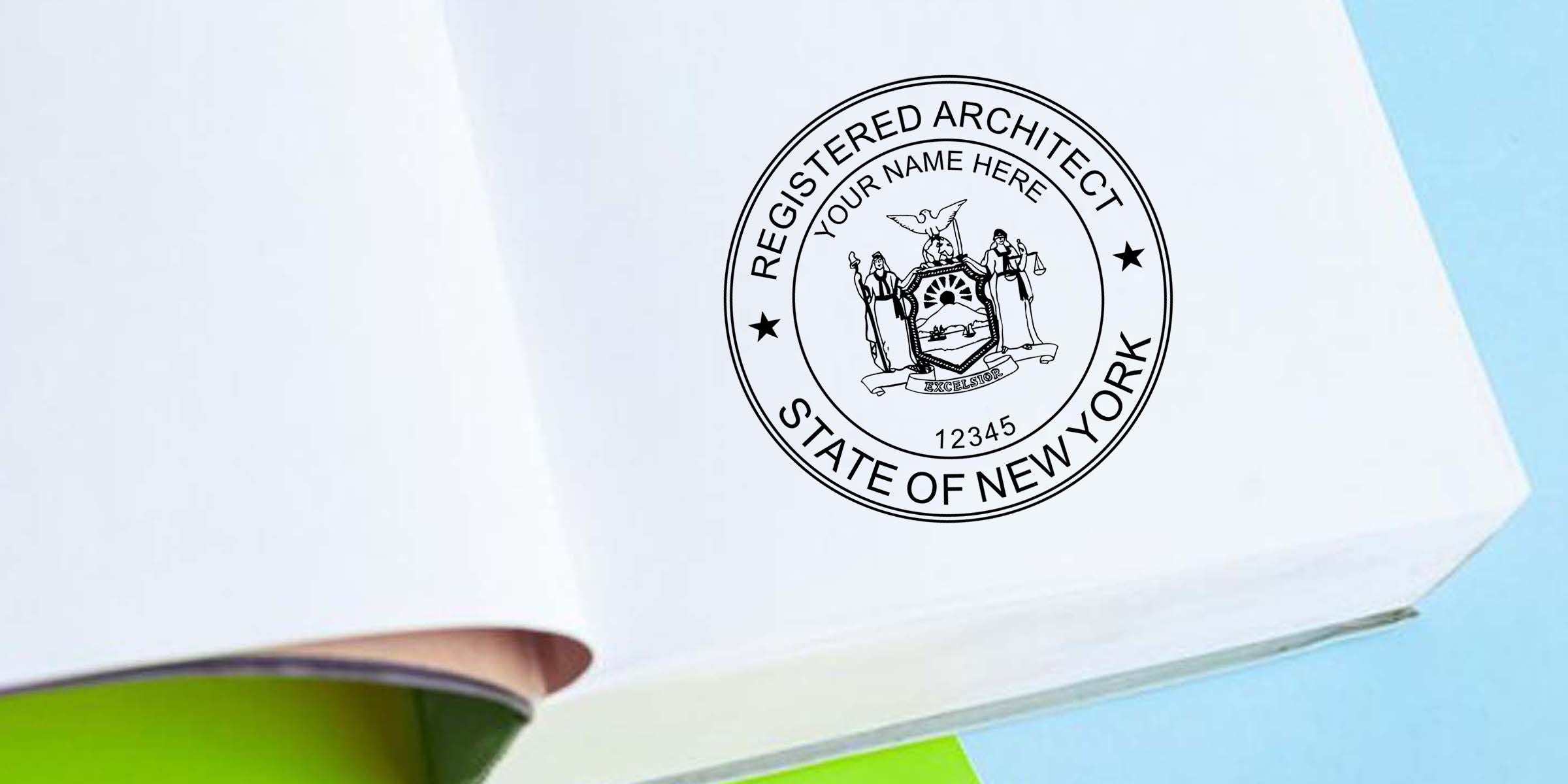 Close-up of a New York State Registered Architect seal on white paper with “Your Name Here” and license number 12345, against a light blue background