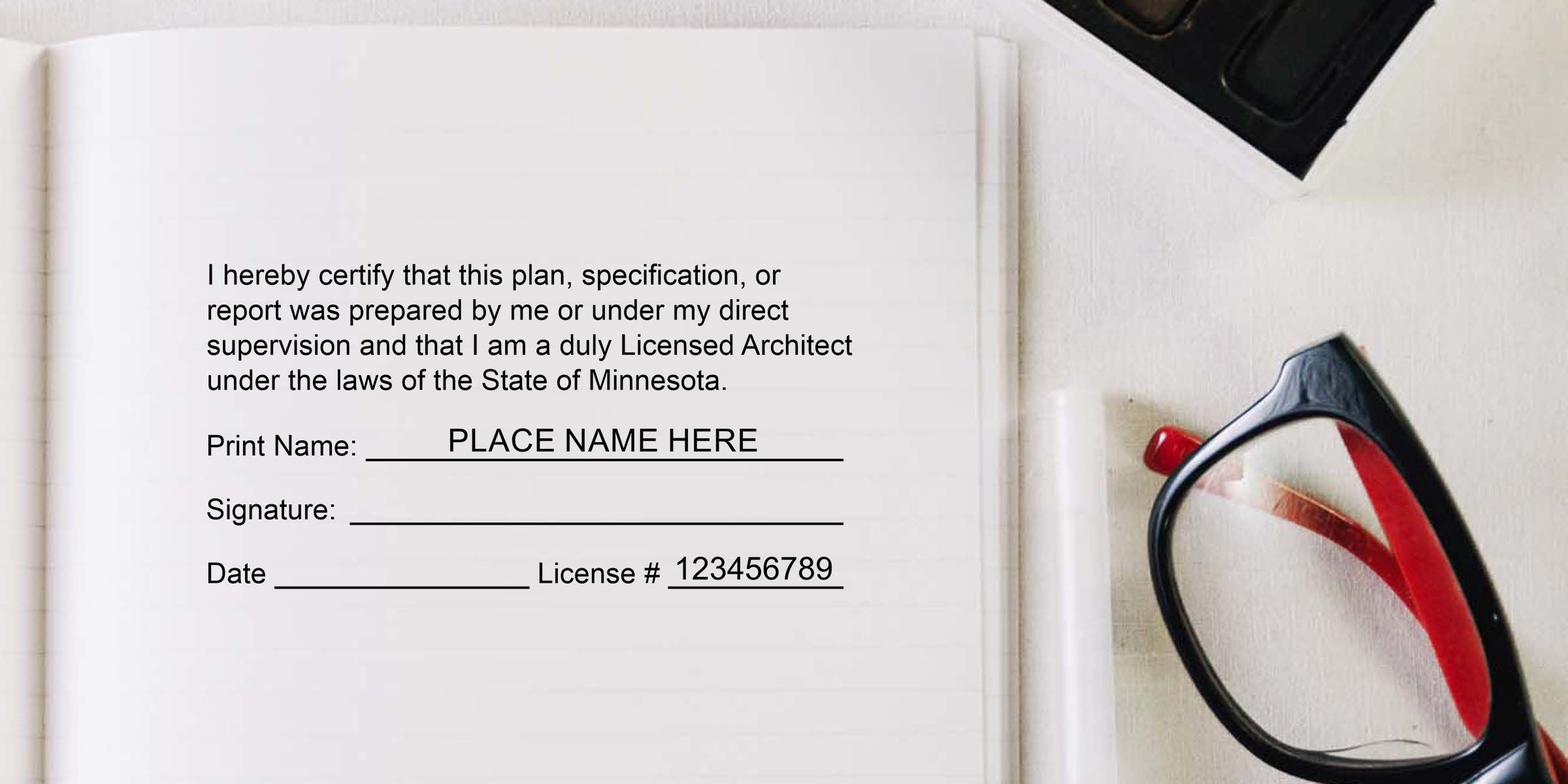 Architect certification form in a notebook with print name, signature, date, and license number fields beside black and red eyeglasses on a desk