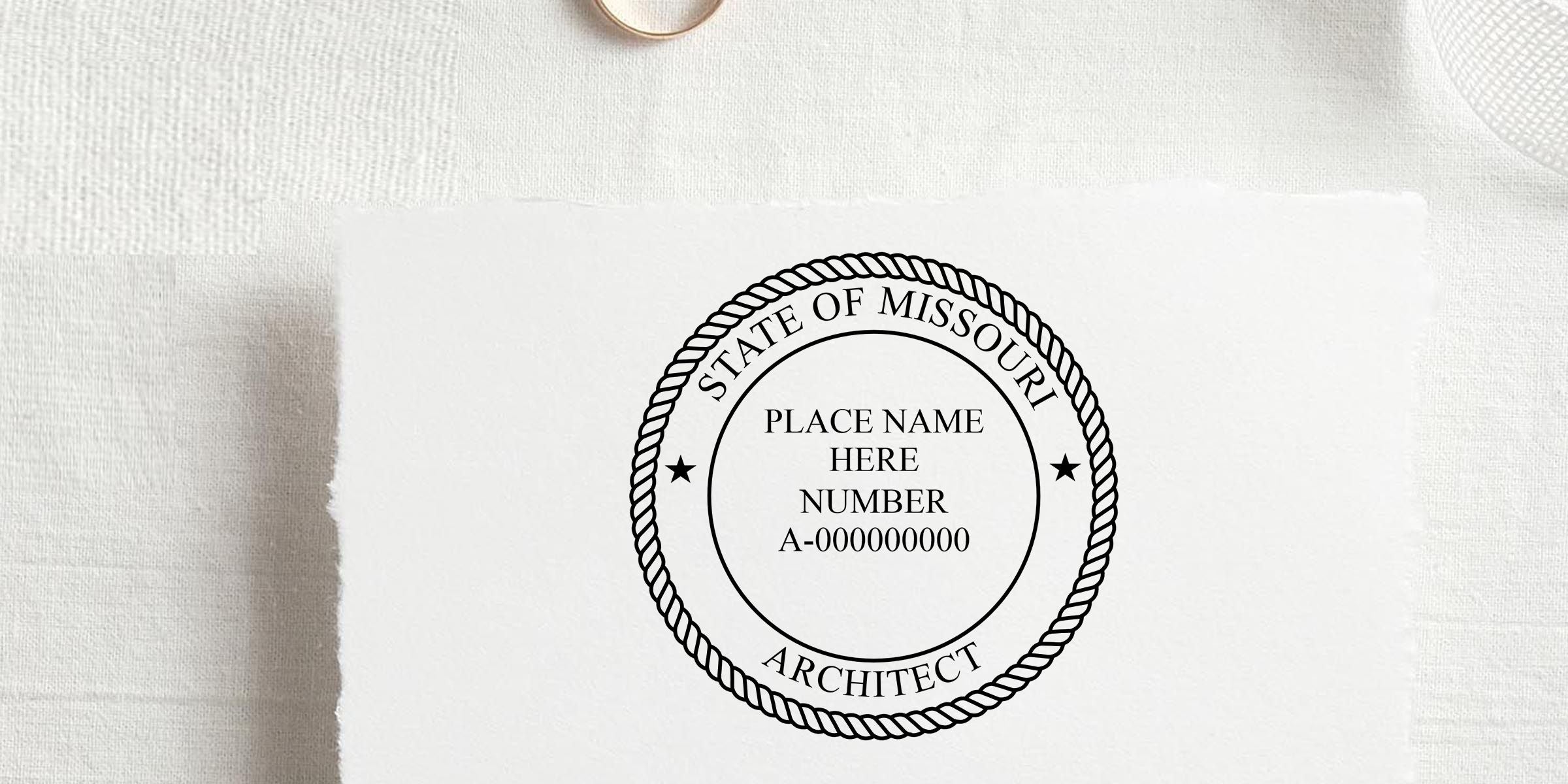 Missouri architect seal stamp template with rope border, place name placeholder, and license number on white fabric background
