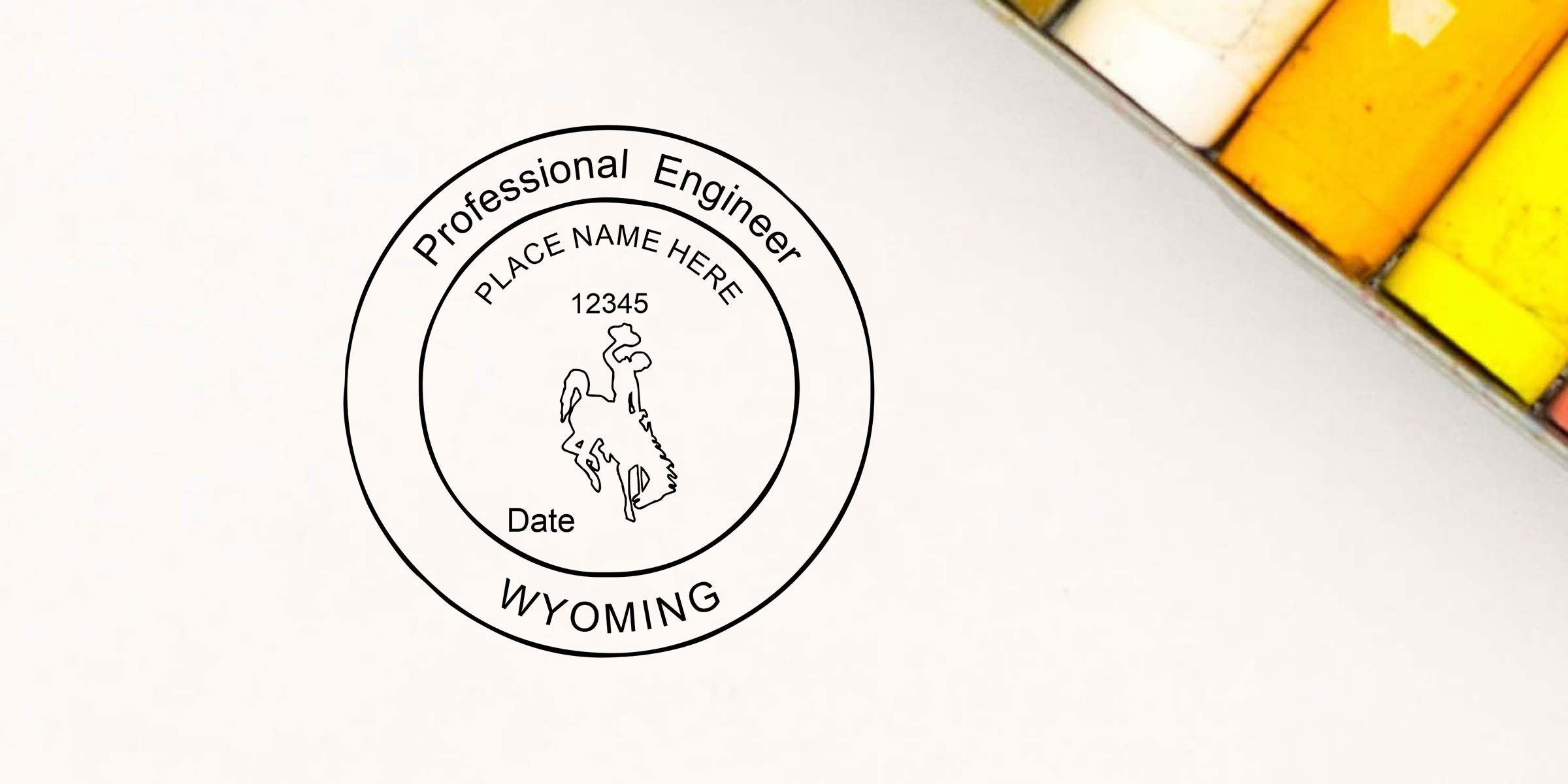 Wyoming Professional Engineer stamp template with placeholder name, date, license number, and state silhouette on a white background
