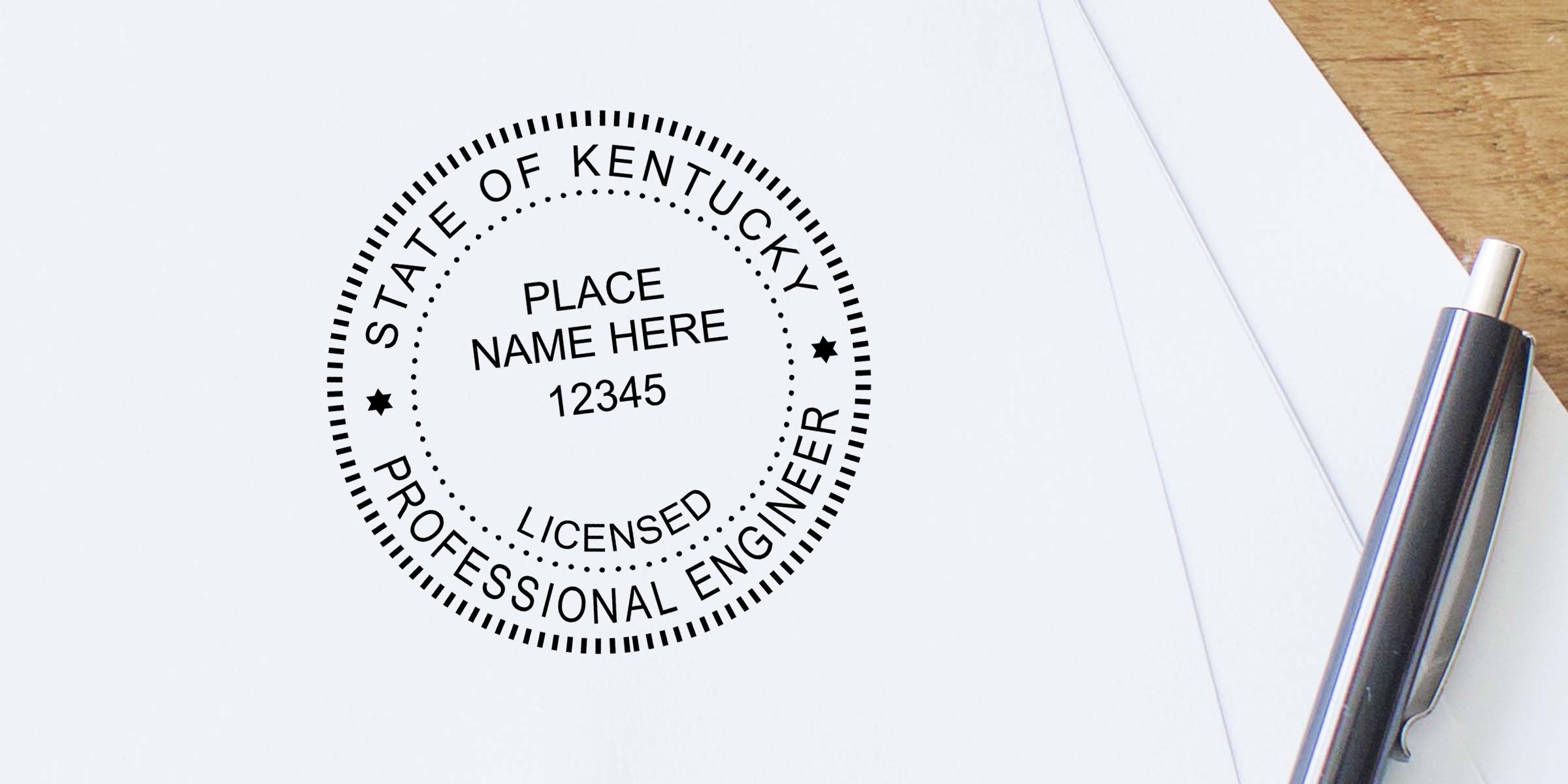 Kentucky Professional Engineer license seal stamped on documents beside a pen on a desk