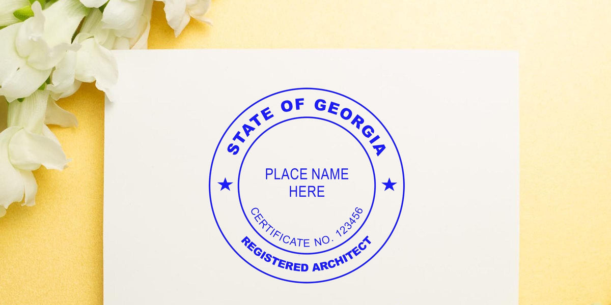 Georgia architect seal on white paper with flowers, showing a professional digital seal and official Georgia architect license emblem.