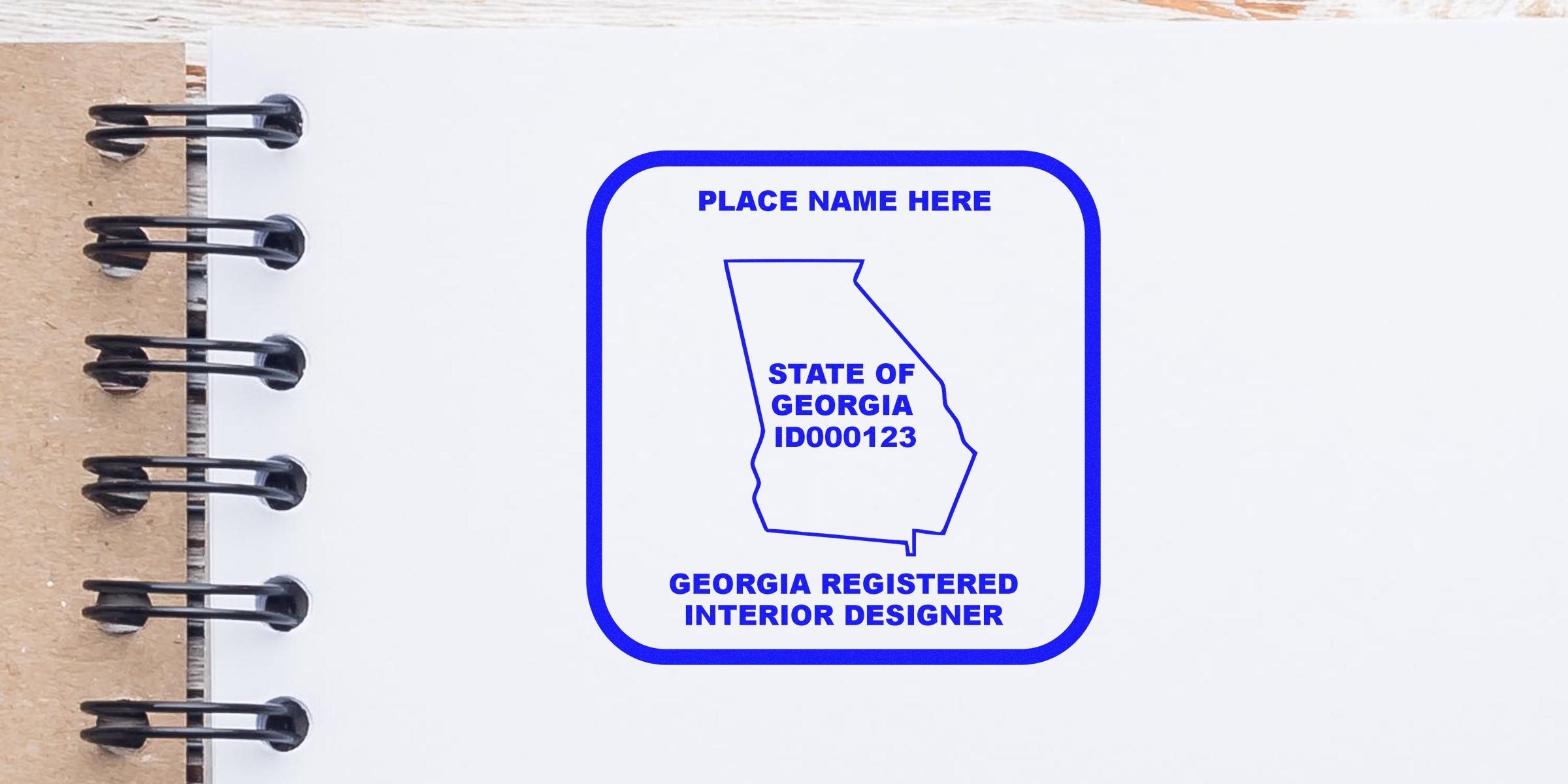 Georgia interior designer stamp on spiral notebook, linked to stamp cost and interior design licensing in Georgia.
