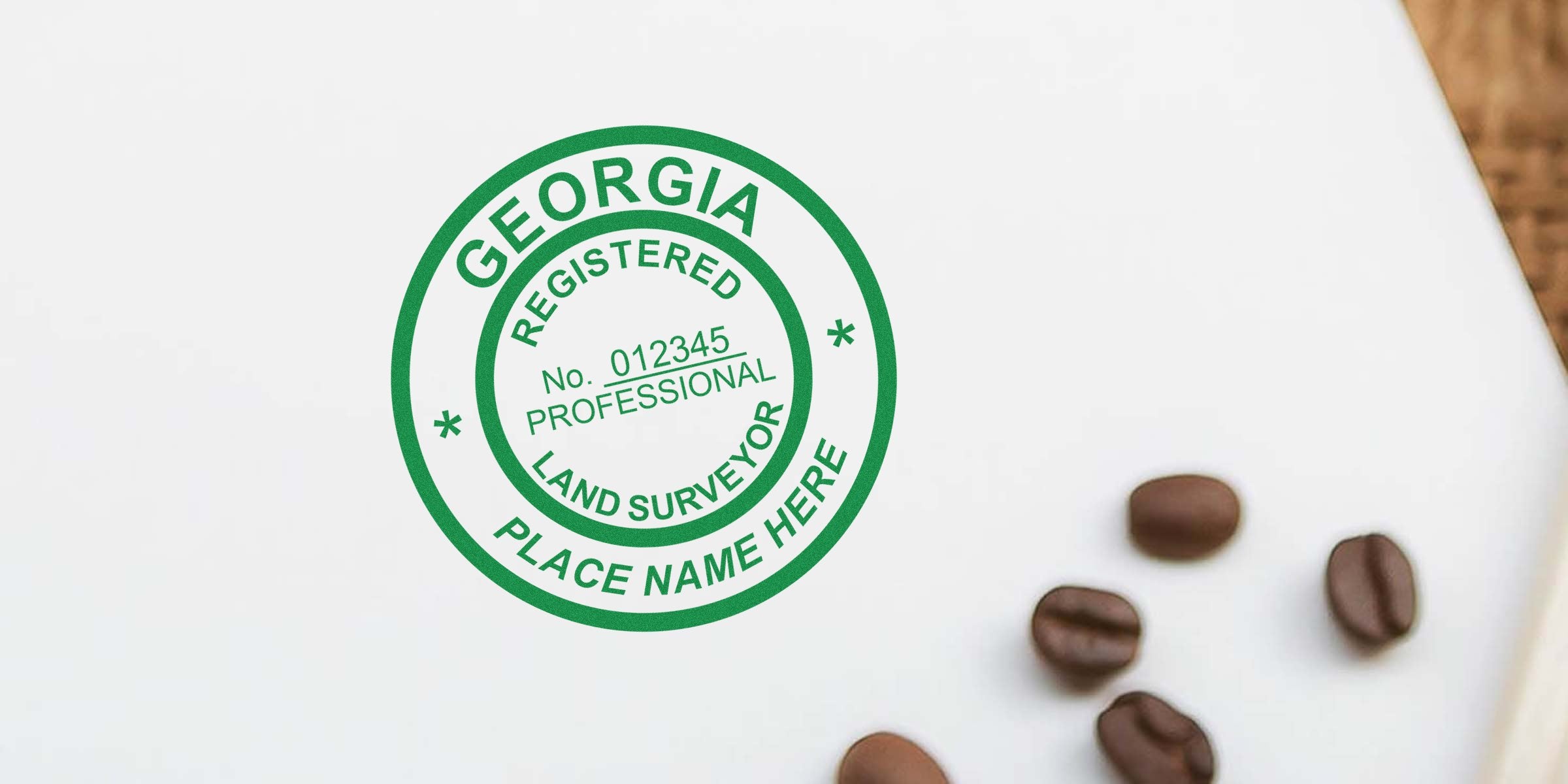 Georgia land surveyor stamp in blue, certified, with coffee beans on a white background.