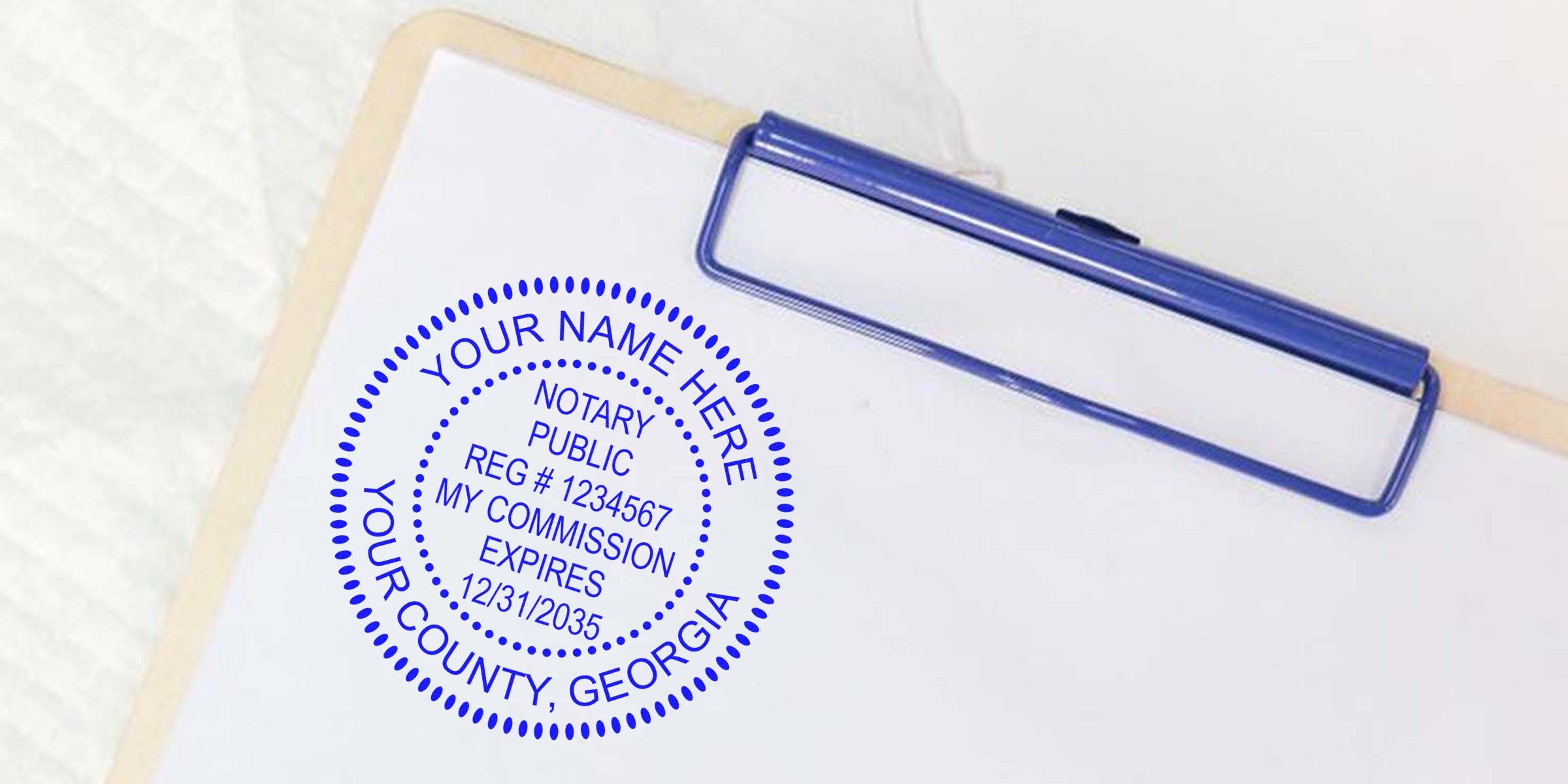 Custom Georgia notary seal stamp on clipboard with blue ink, displaying Georgia notary public commission and registration details, demonstrating how to obtain a Notary Seal in Georgia.