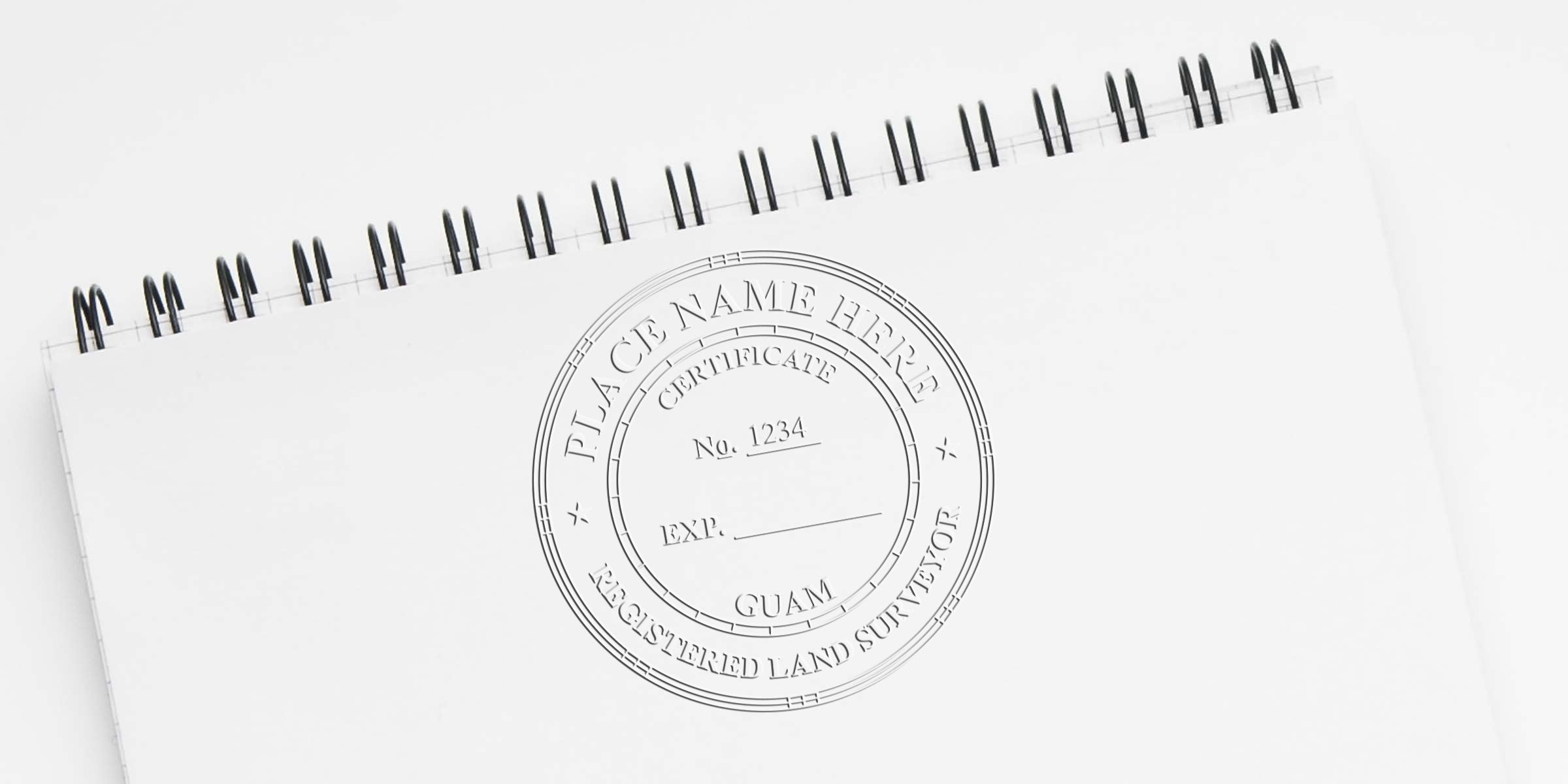 Spiral notebook with a registered land surveyor certificate stamp and Guam land surveyor seal, displaying land surveyor seal templates.