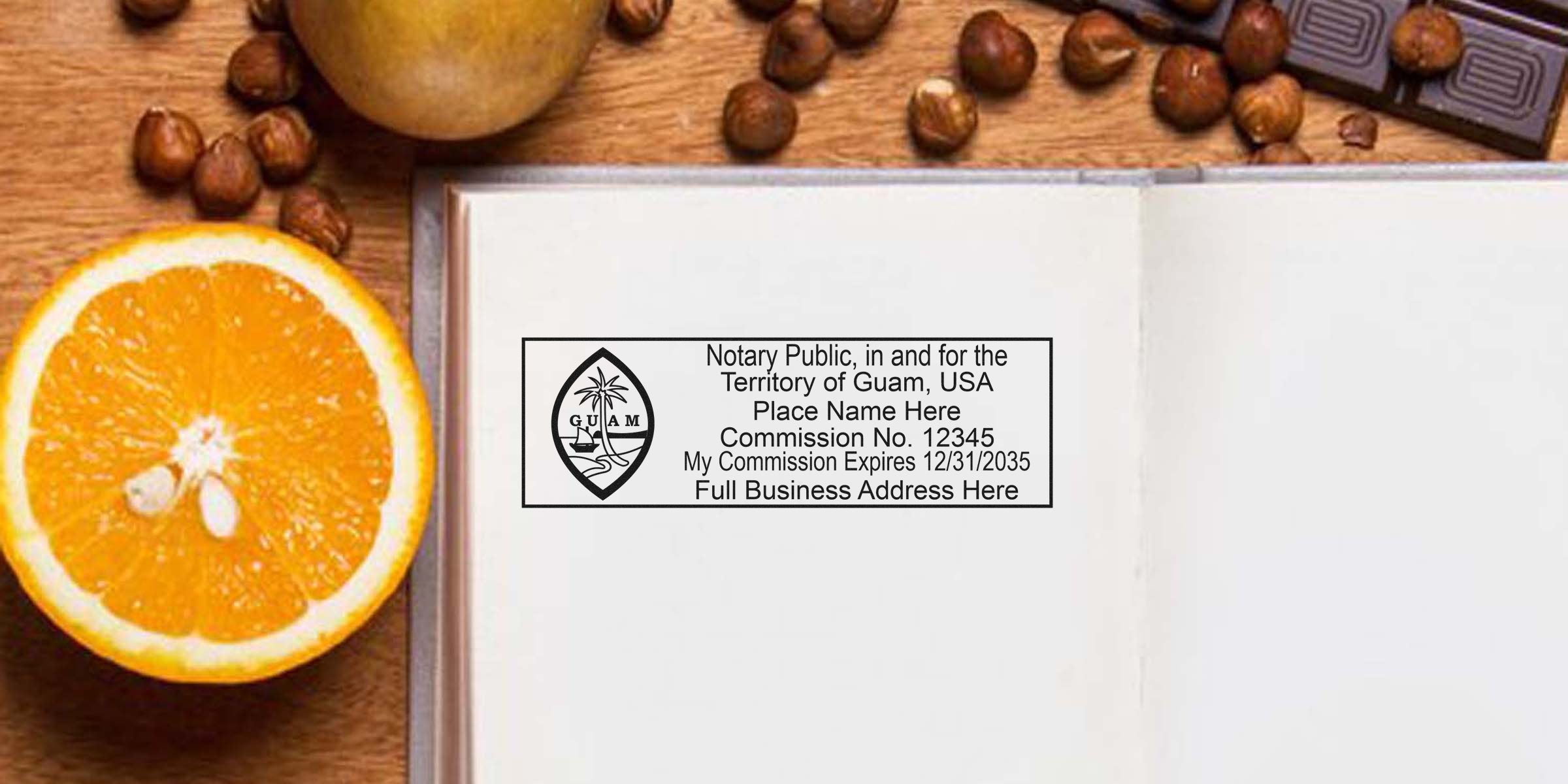 Guam notary public stamp with commission number and business address on open notebook page, complying with Guam notary seal requirements and guidelines.