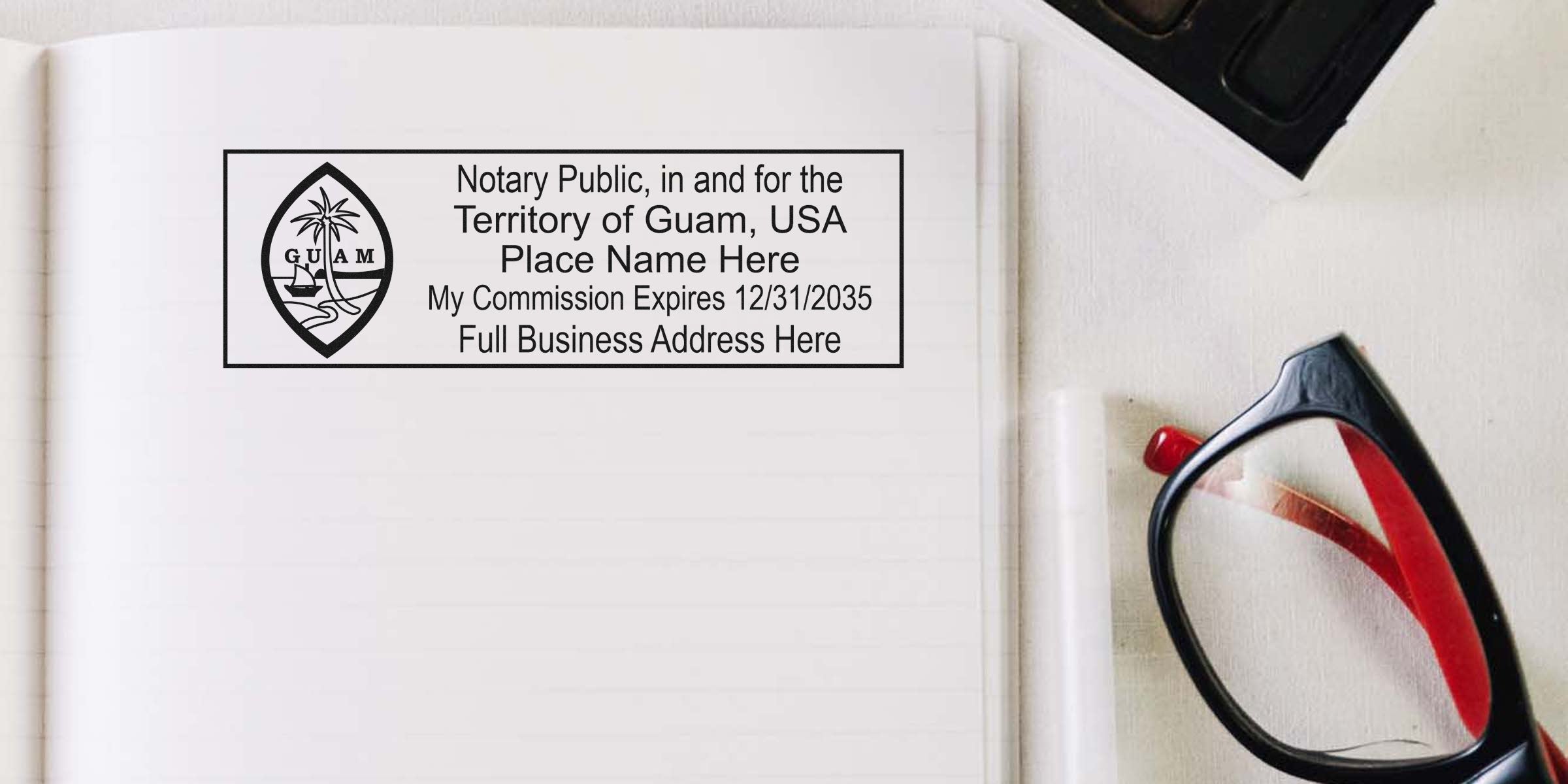 Guam notary stamp for Territory of Guam with commission expiry and business address on white paper next to black and red reading glasses. Buy notary stamps online.