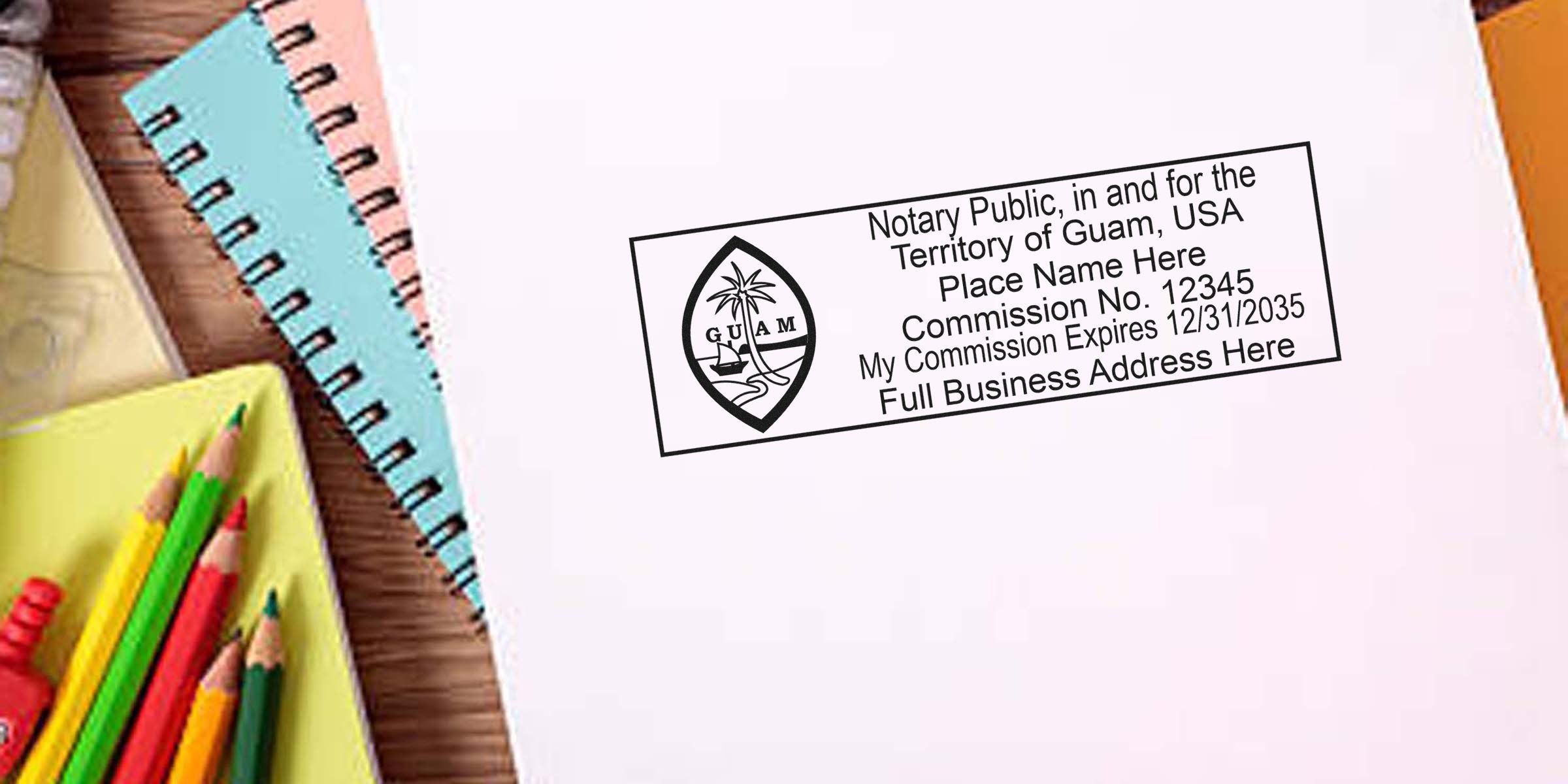 Guam notary stamp on white paper with colorful pencils and notebooks on a wooden desk, displaying a notary stamp sample.