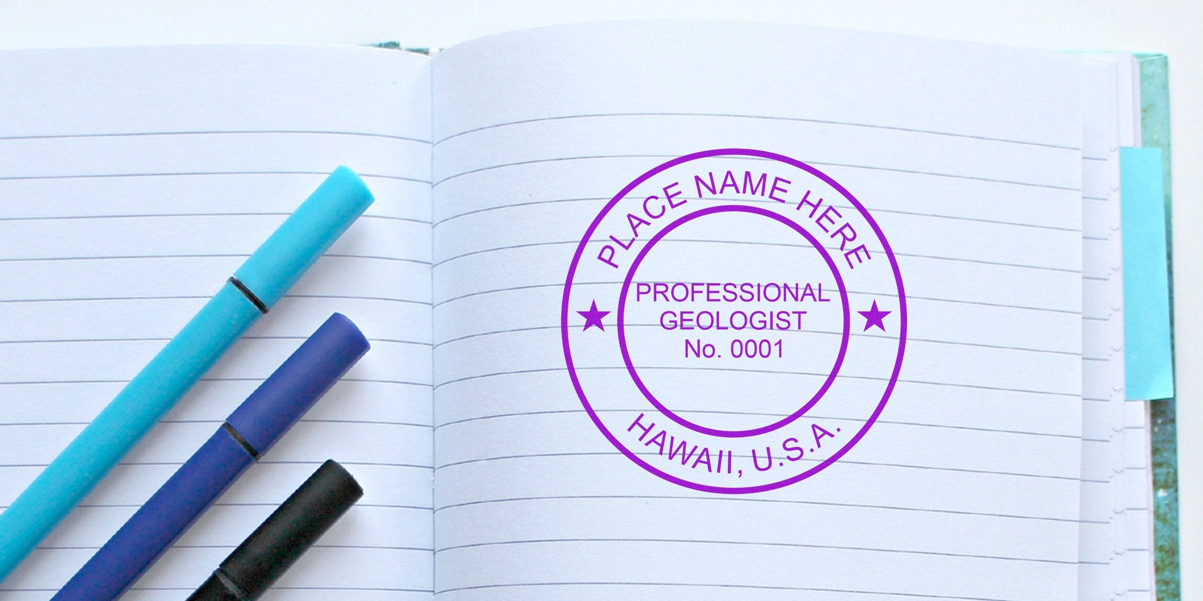 Hawaii Geologist Stamp on open notebook with blue pens, showing professional geology certification and detailed stamp info, Hawaii USA.