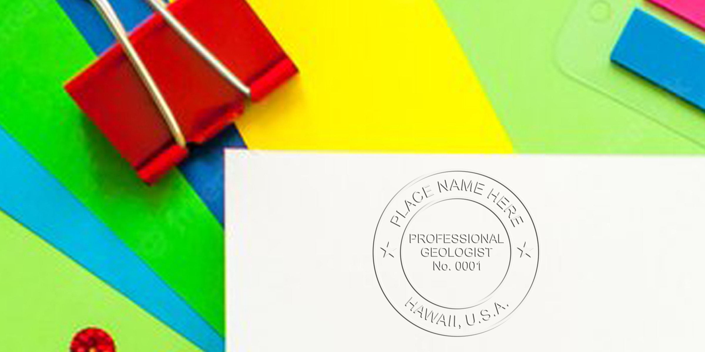 Professional geologist stamp on white paper with colorful office supplies, showing official Hawaii geology certification seal; includes details on Hawaii geologist stamp cost and pricing.