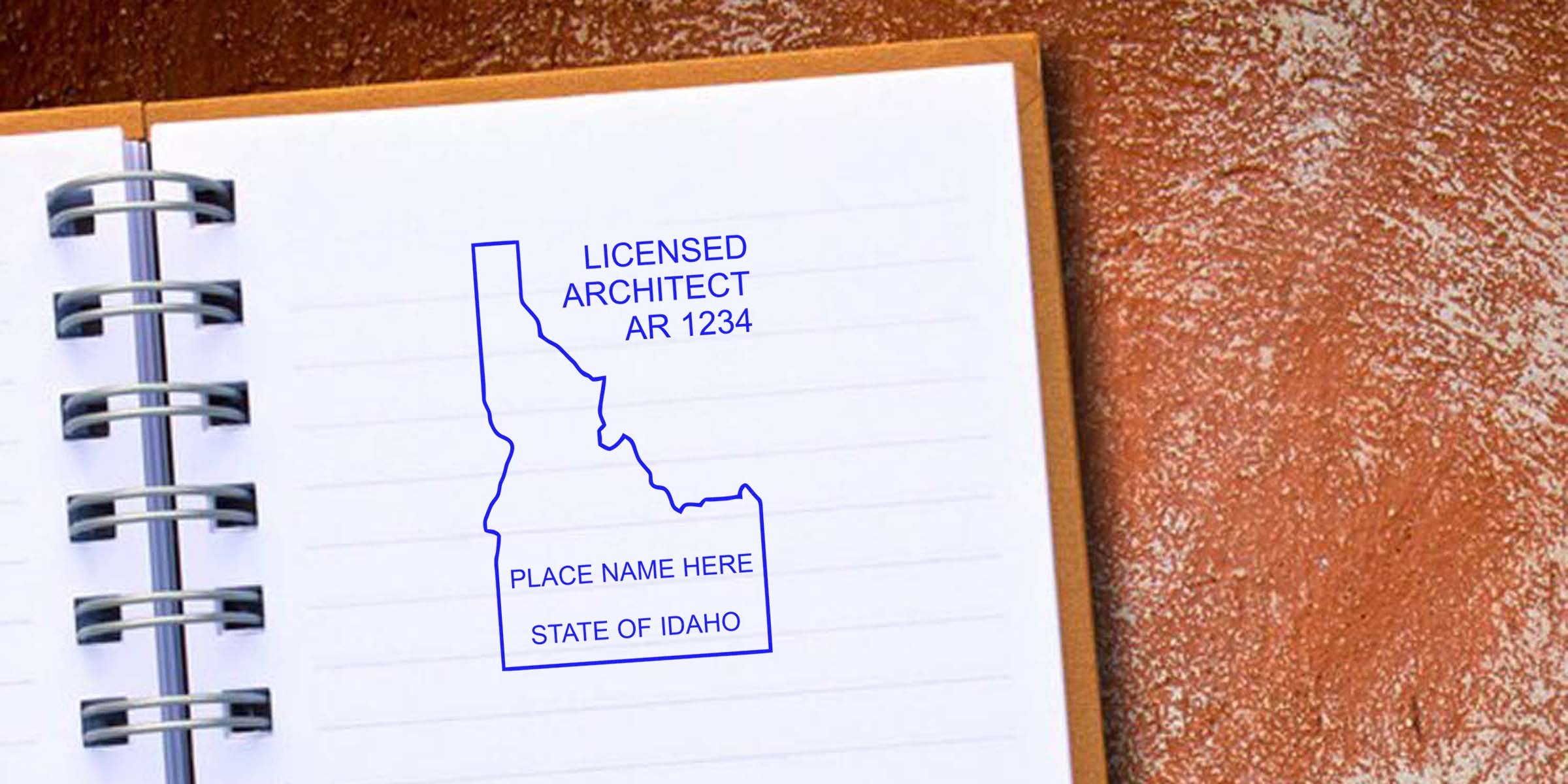 Idaho architect stamp on notebook page showing state and place name, illustrating Idaho architect stamp requirements and guide.