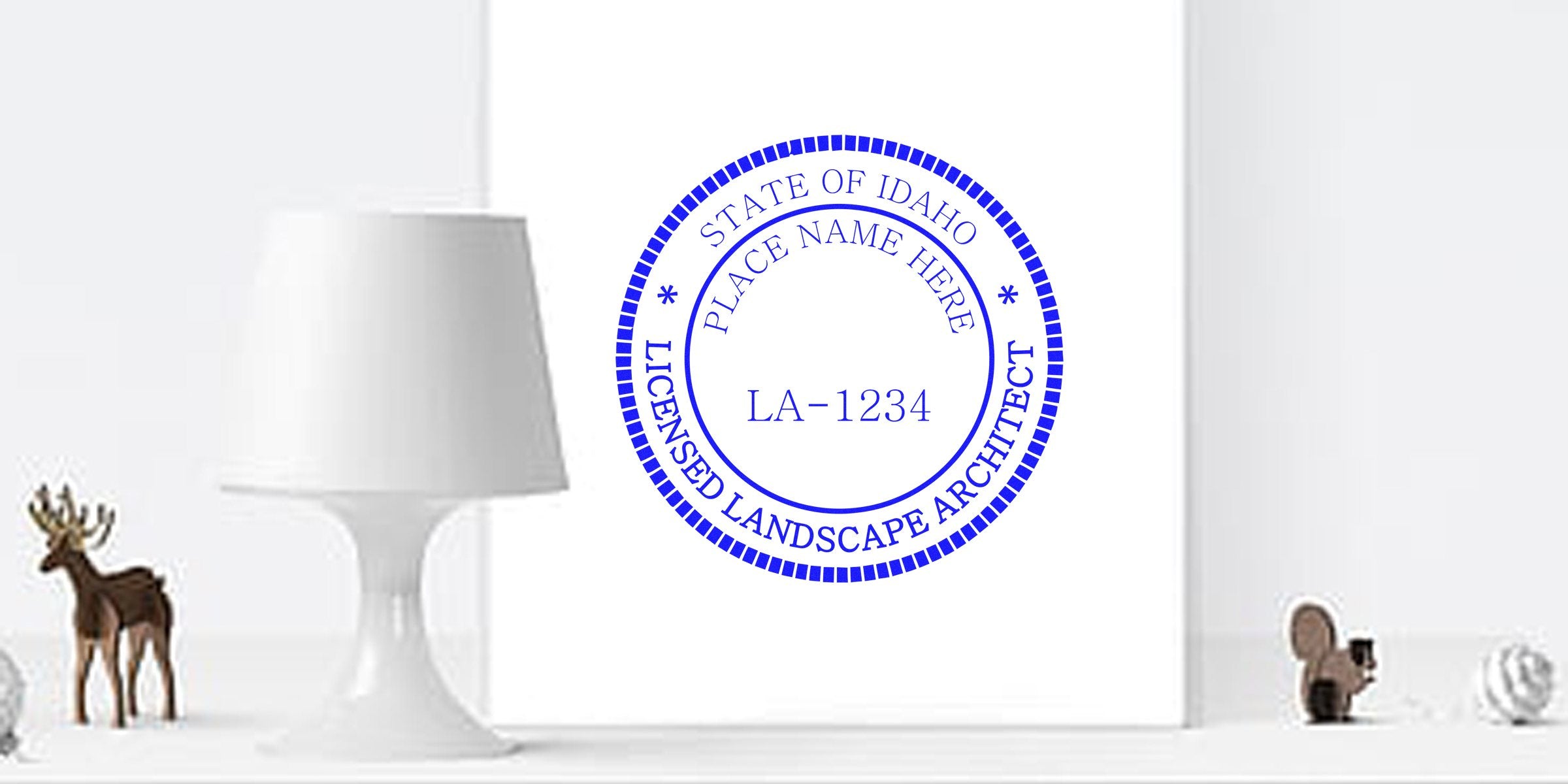 Idaho Landscape Architect Seal with a lamp and decorative animal figurines on a white shelf, symbolizing landscape architecture certification in Idaho.