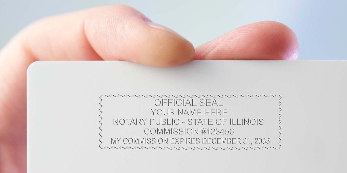 Embossed notary public seal on white card showing Illinois notary seal requirements per the Illinois notary seal guide for commission verification.