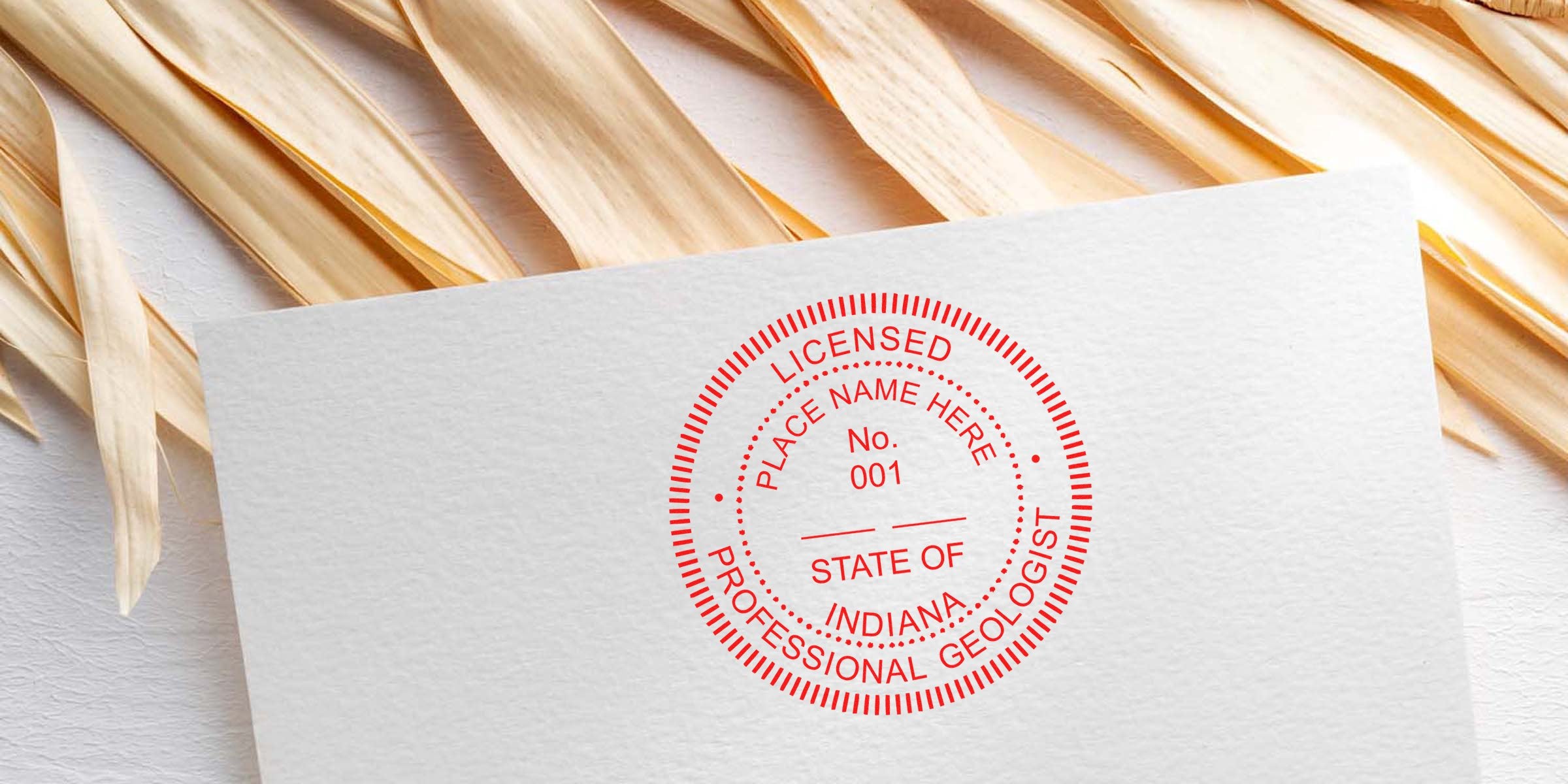 Indiana geologist seal embossed on white paper using a geologist seal embosser.