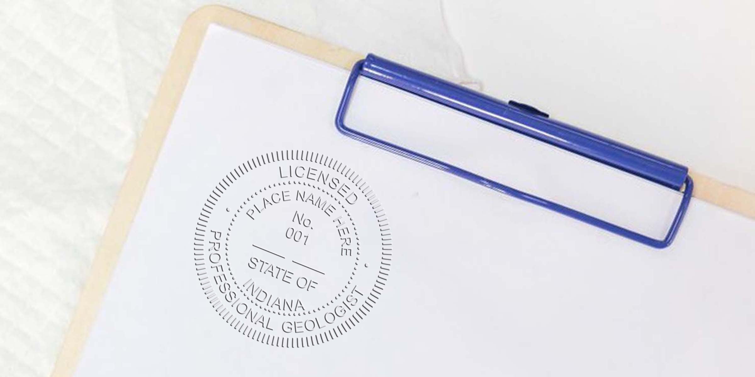 Licensed professional geologist stamp on clipboard paper for Indiana Geologist Stamp and License Renewal certification.