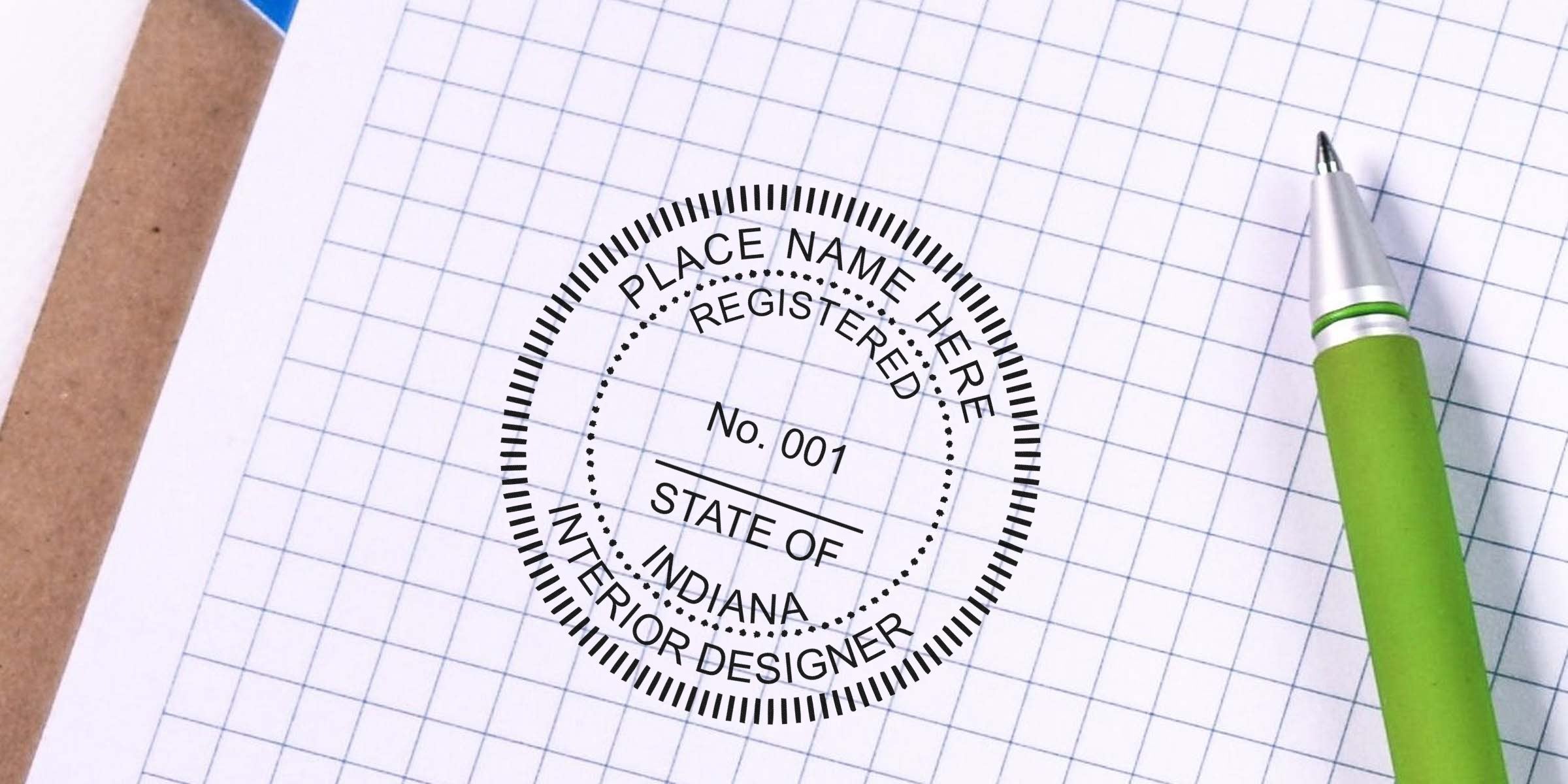 Indiana interior design seal stamped on graph paper with a green pen, symbolizing registered interior design in Indiana.