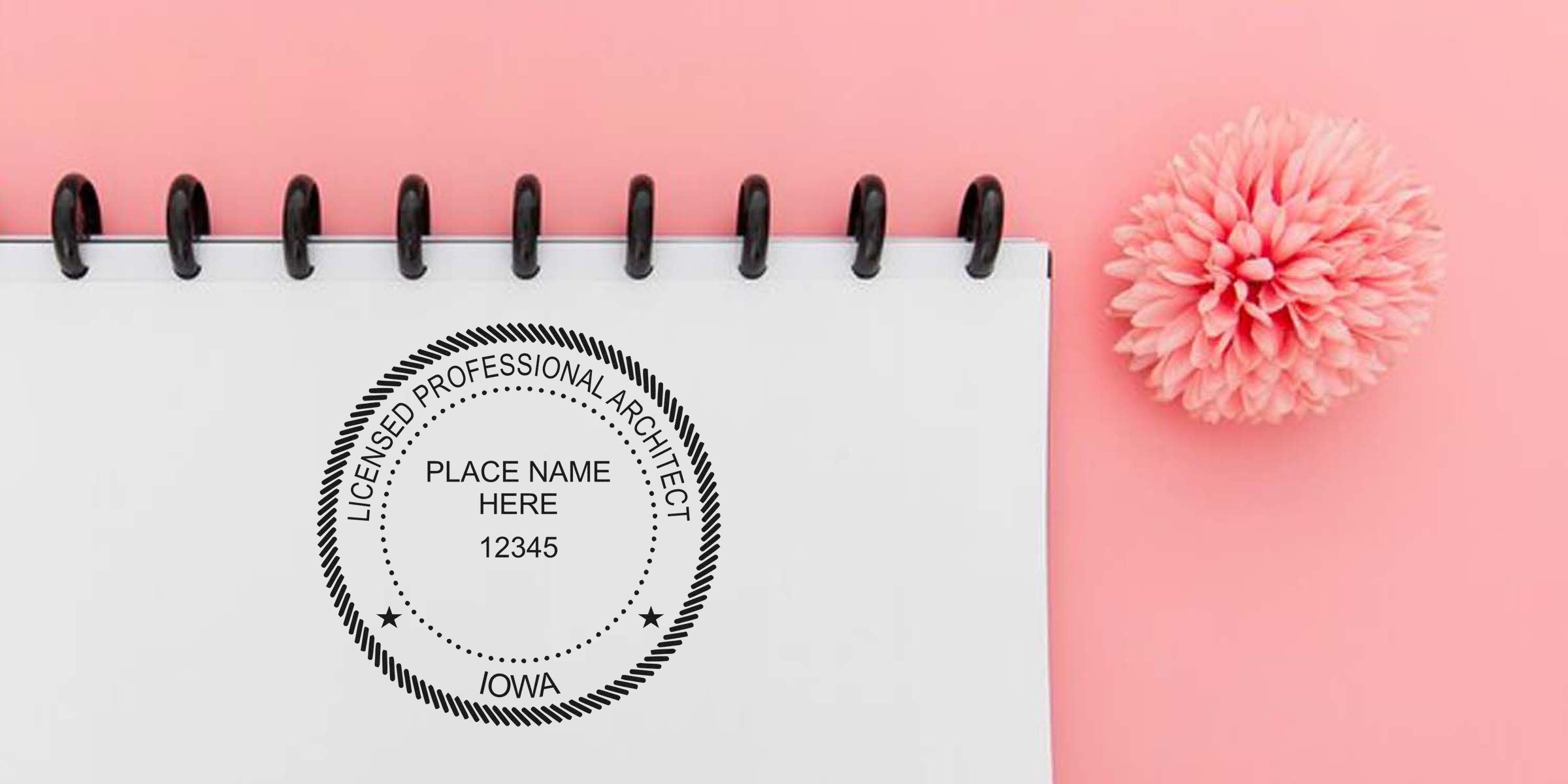 Iowa architect seal embosser on white notebook with pink flowers, licensed professional architect stamp, choosing architect seal tool.