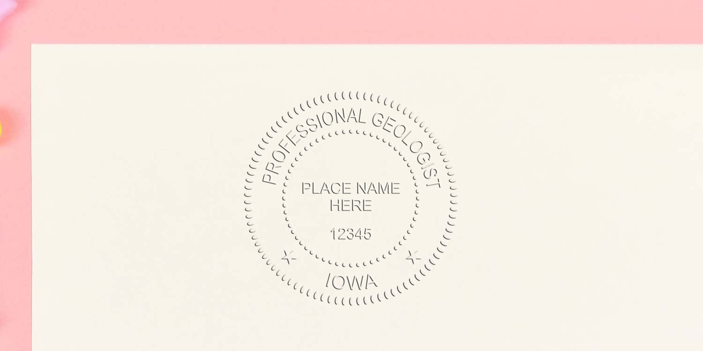 Custom geologist stamp with Iowa seal, place name, and license number on white paper background.