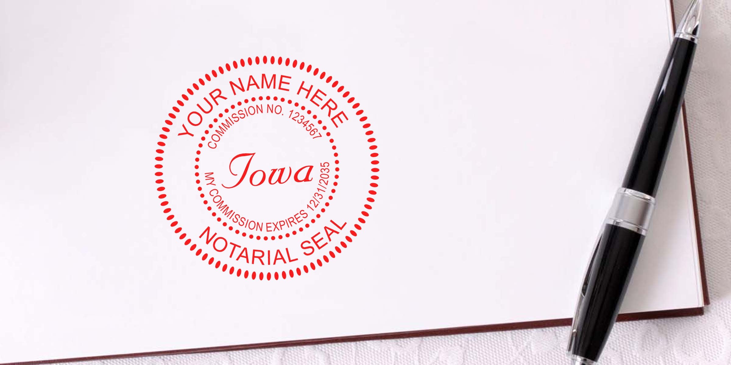 Iowa notary seal stamp on white paper with black pen, showing the official seal for Iowa notaries and how to meet Iowa notary requirements.