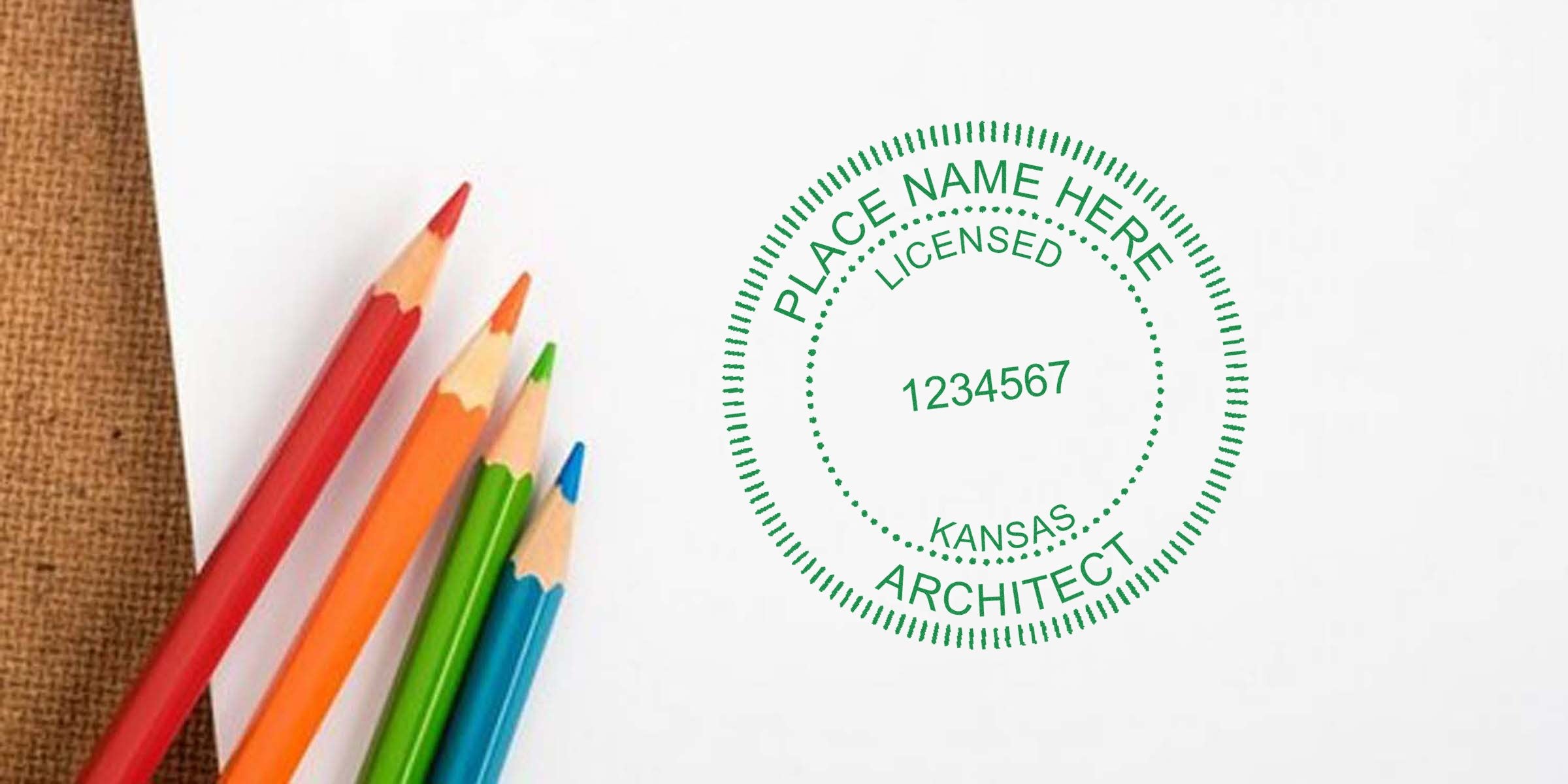Colored pencils on white paper show a Kansas architect stamp, emphasizing the requirements for architect stamps in Kansas.