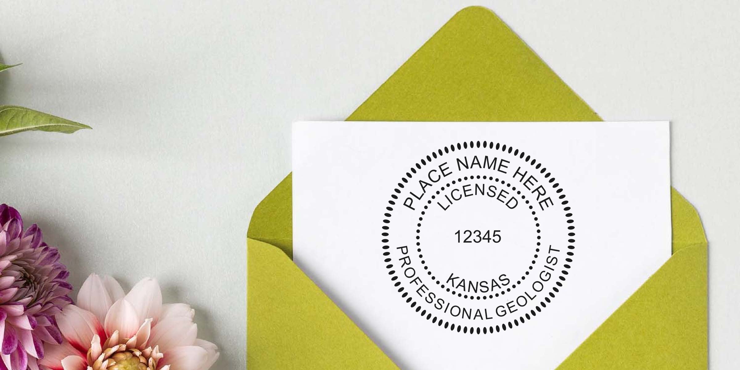 Kansas geologist stamp on white paper with licensed professional seal, inside green envelope with flowers, showcasing Kansas geologist stamp regulations.