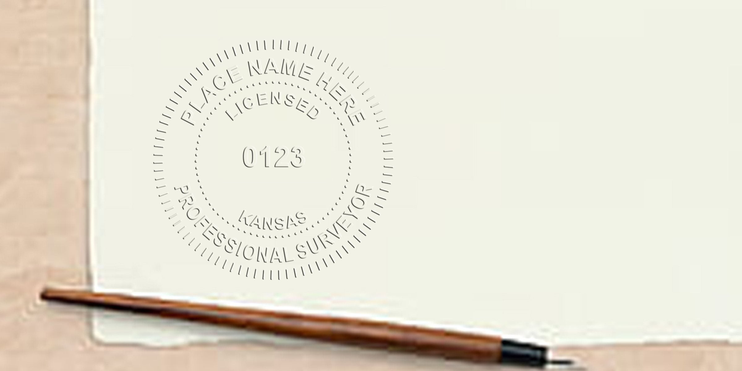Kansas licensed professional surveyor embossed seal on paper with drafting pen, displaying Kansas land surveyor stamp size and dimensions.