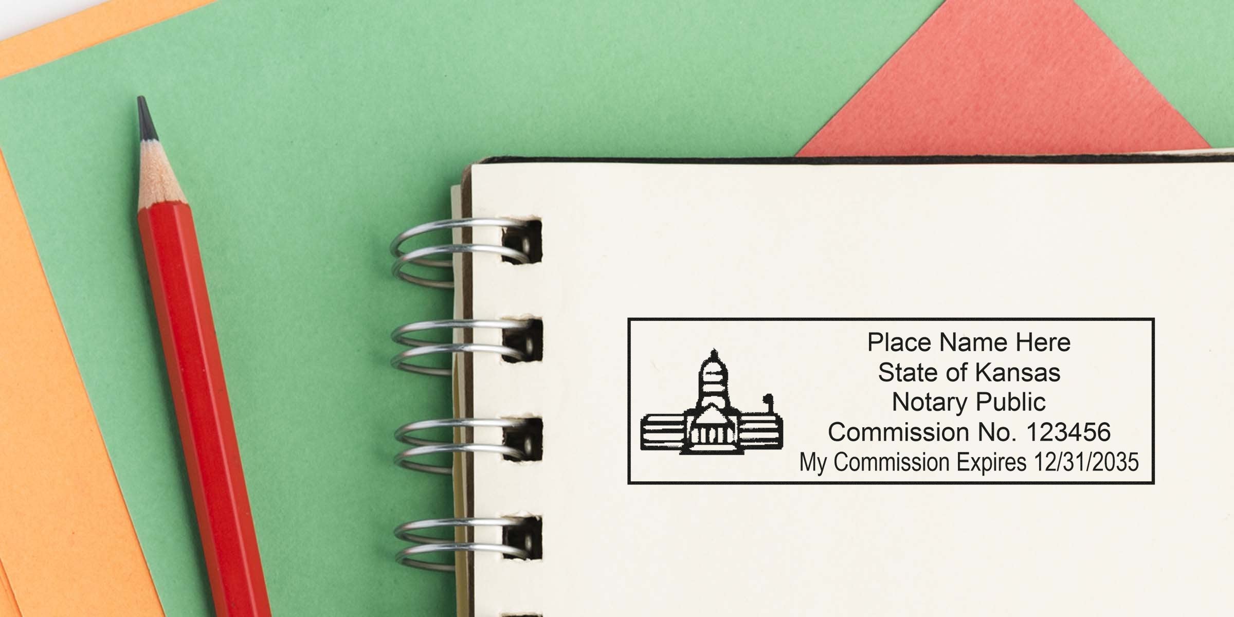 Kansas notary stamps on a notebook with a red pencil and colorful paper, highlighting notary public options in Kansas.