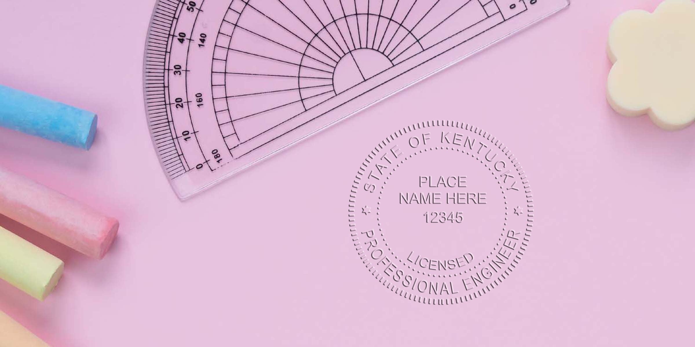 Kentucky professional engineer seal with pastel chalks and protractor on pink background, showcasing stamp size and tips for selecting a Kentucky engineer stamp.