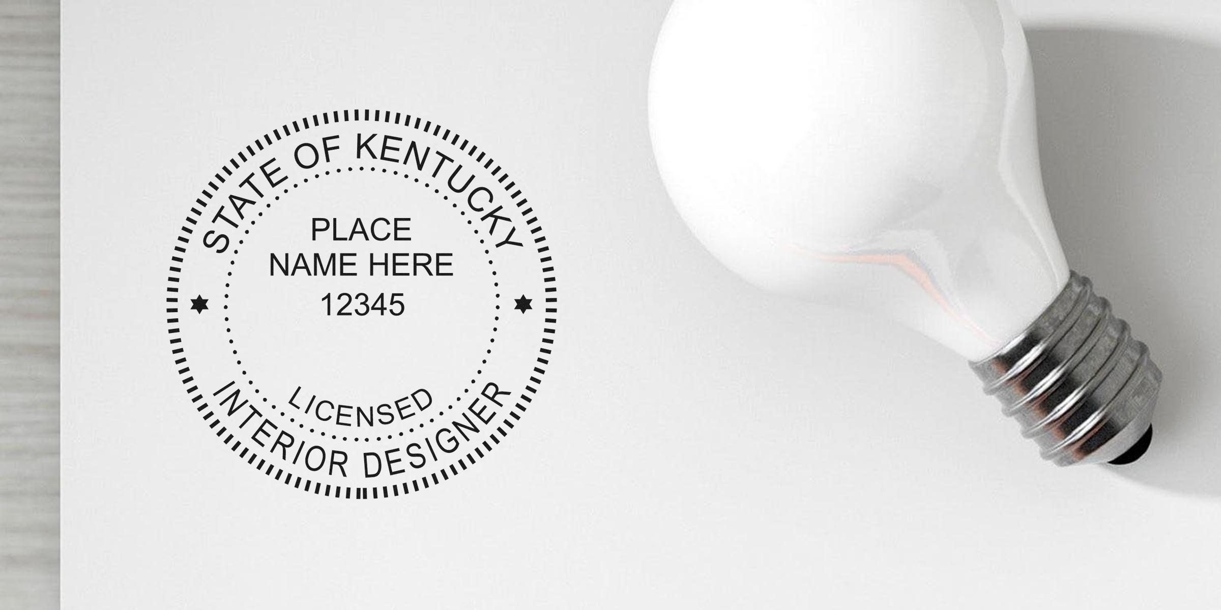 Kentucky interior designer stamp with light bulb, showing licensed stamp size and meeting Kentucky interior design stamp requirements on white background.