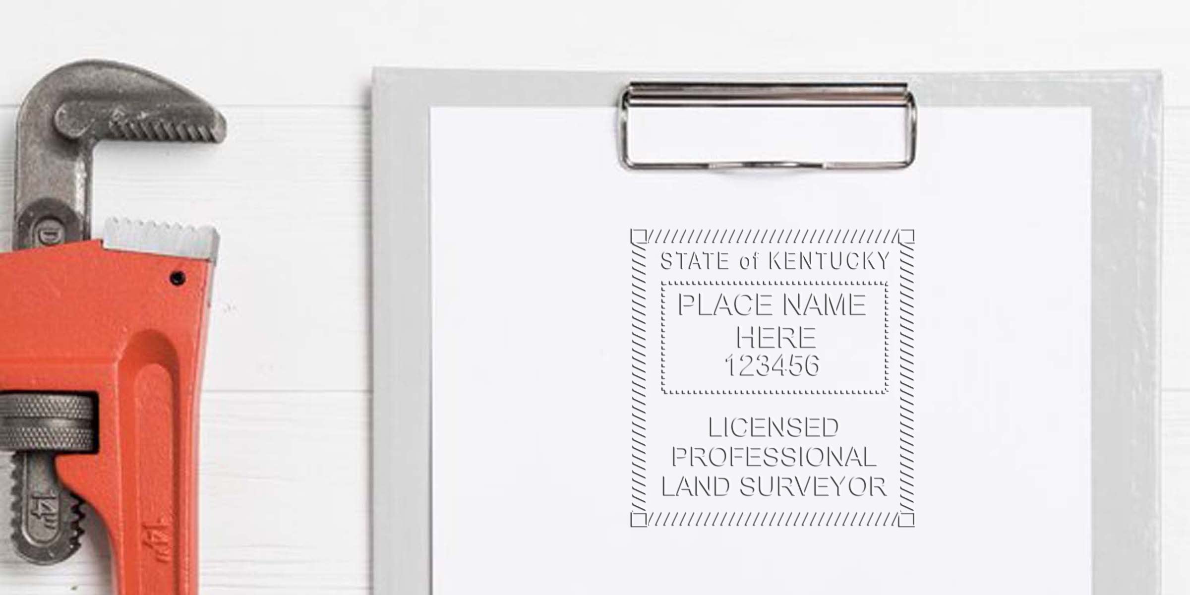 Kentucky land surveyor seal on clipboard with plumbing wrench, showing licensed professional stamp per land surveyor seal design guide on white wooden background.