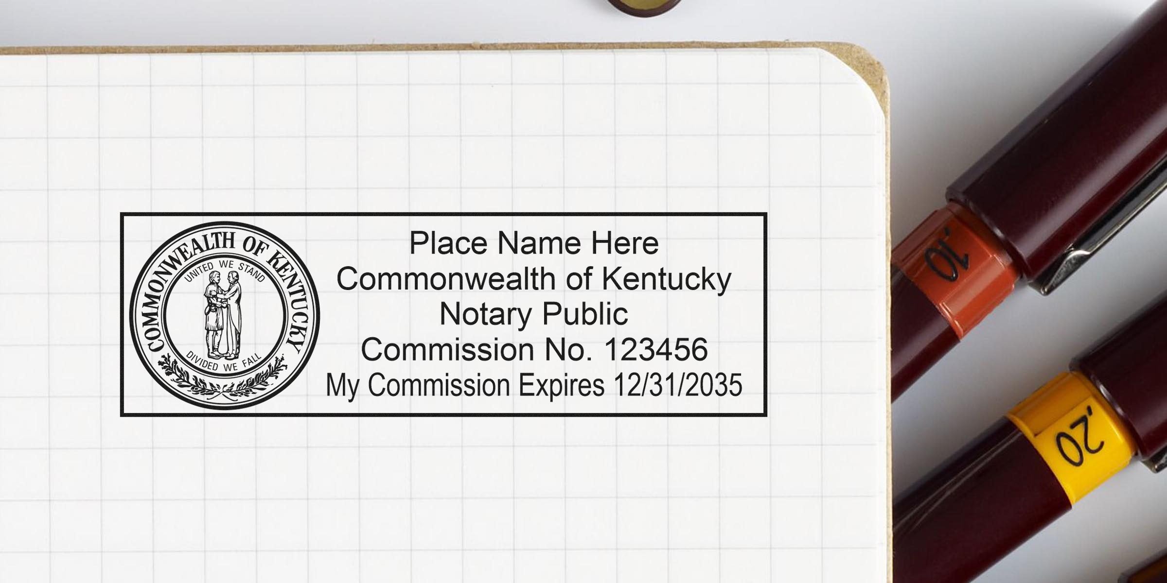 Kentucky notary seal stamp with commission number and expiration date on grid paper, next to colored pens, highlighting trusted notary supplies.