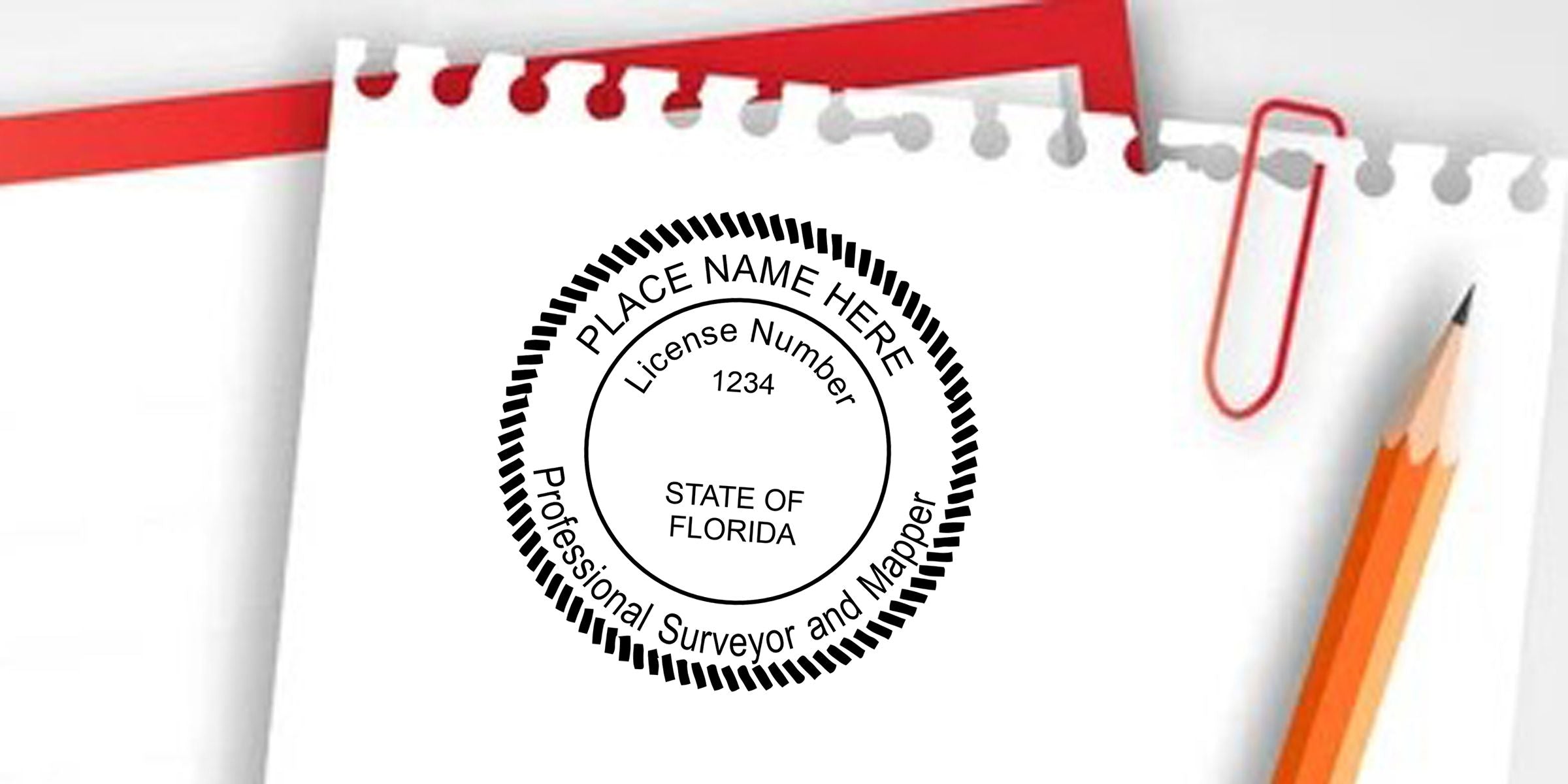 Florida Professional Surveyor and Mapper license seal stamped on a notepad with a pencil and paperclip nearby.