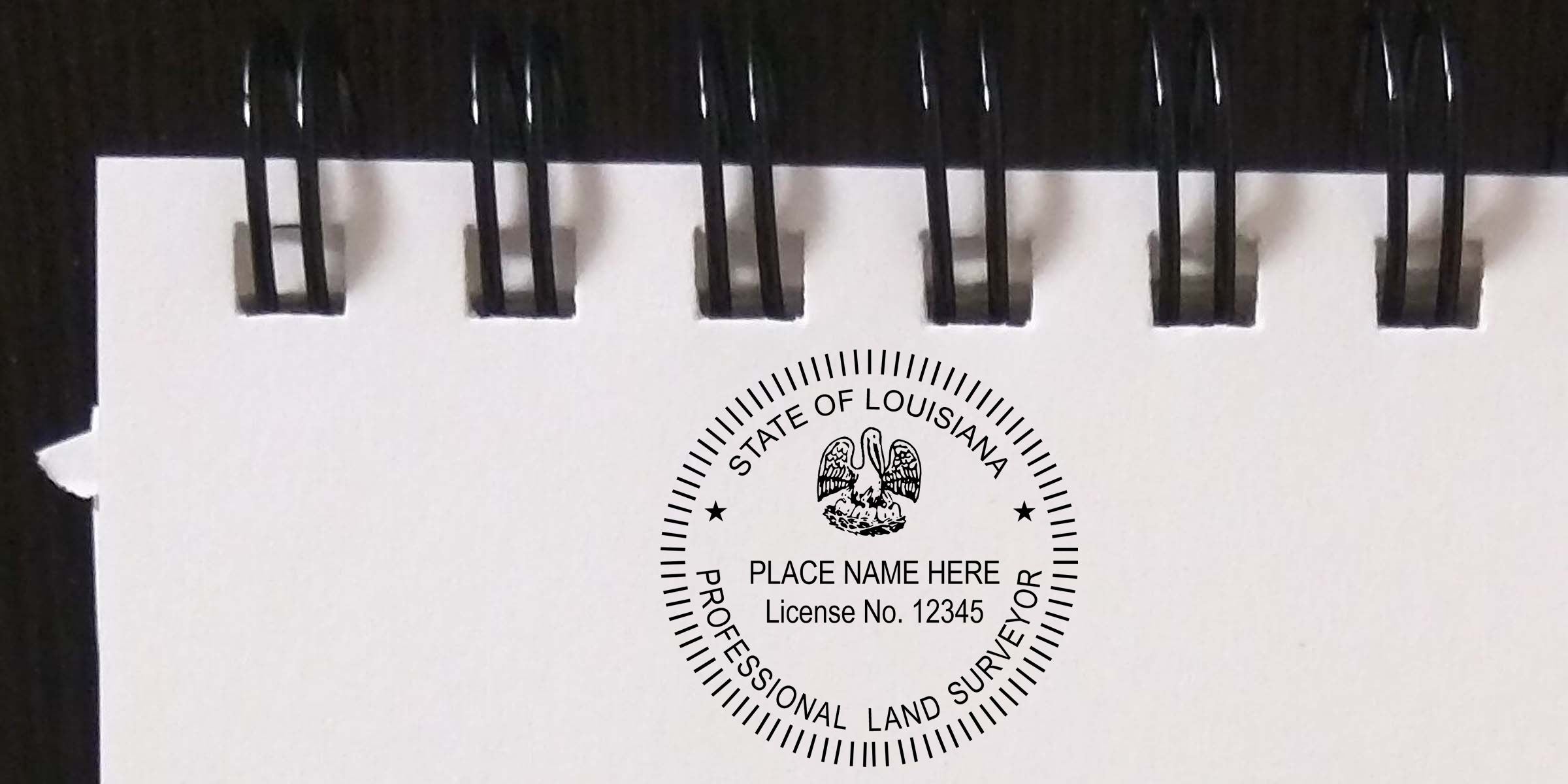 Close-up of a spiral-bound notebook page with a Louisiana professional land surveyor seal, showing “State of Louisiana,” “Place Name Here,” and “License No. 12345” on a white background