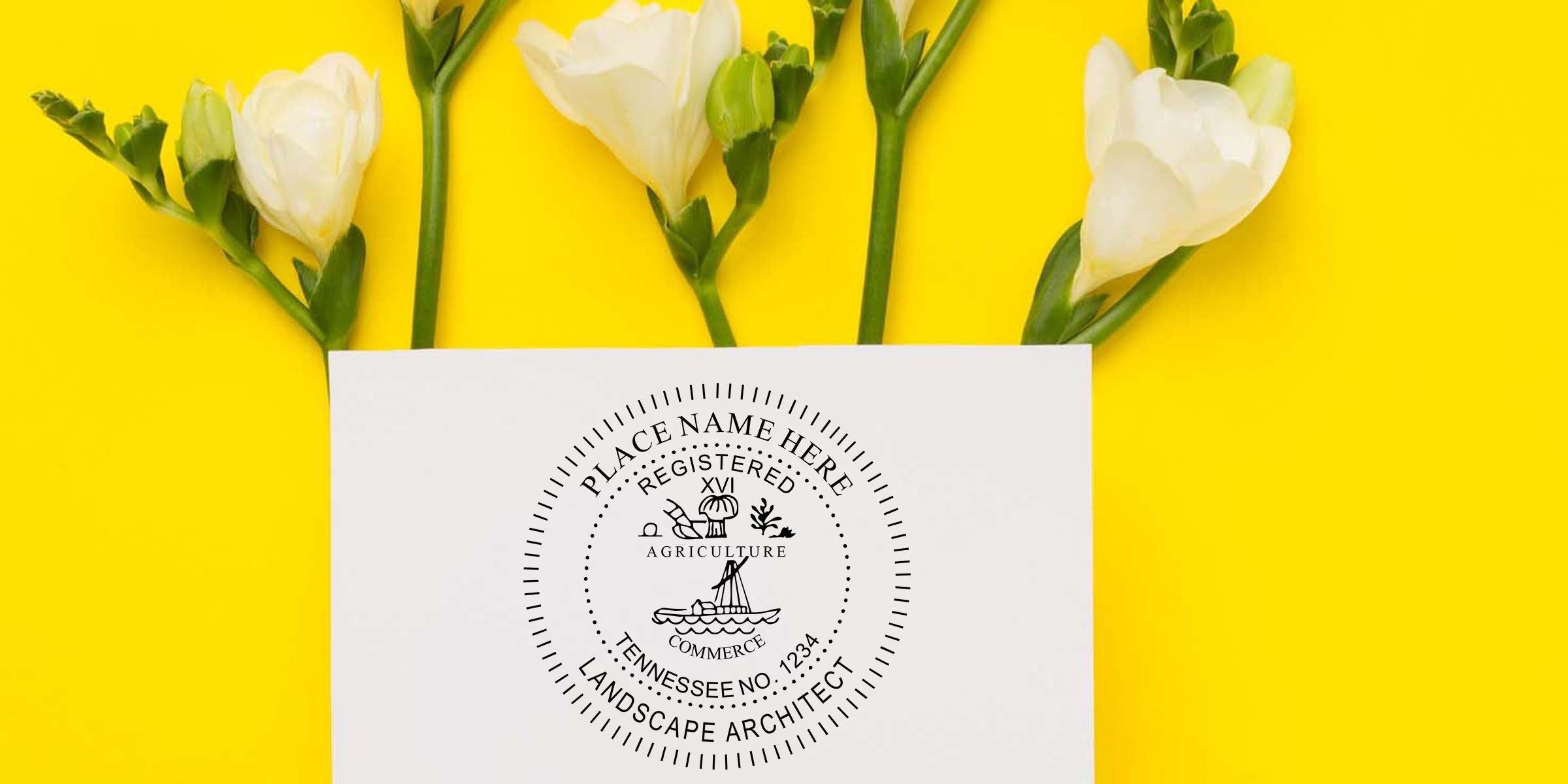 White flowers on a bright yellow background with a landscape architect business card featuring a Tennessee seal logo and custom branding design