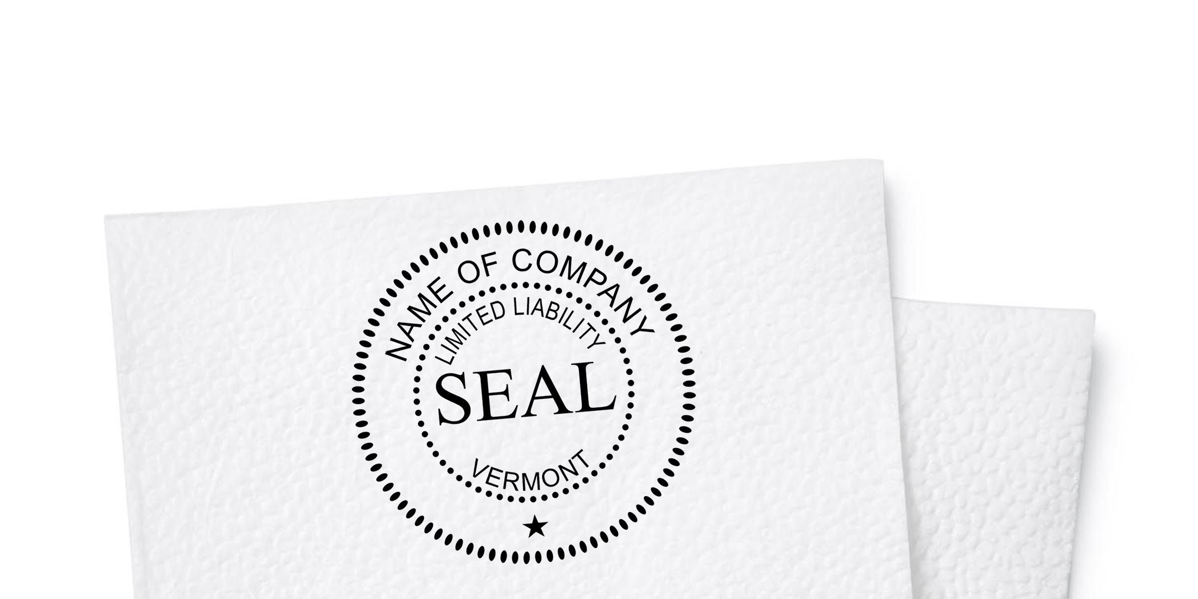 White paper document with a circular company seal stamp reading “Name of Company,” “Limited Liability,” “Seal,” and “Vermont”