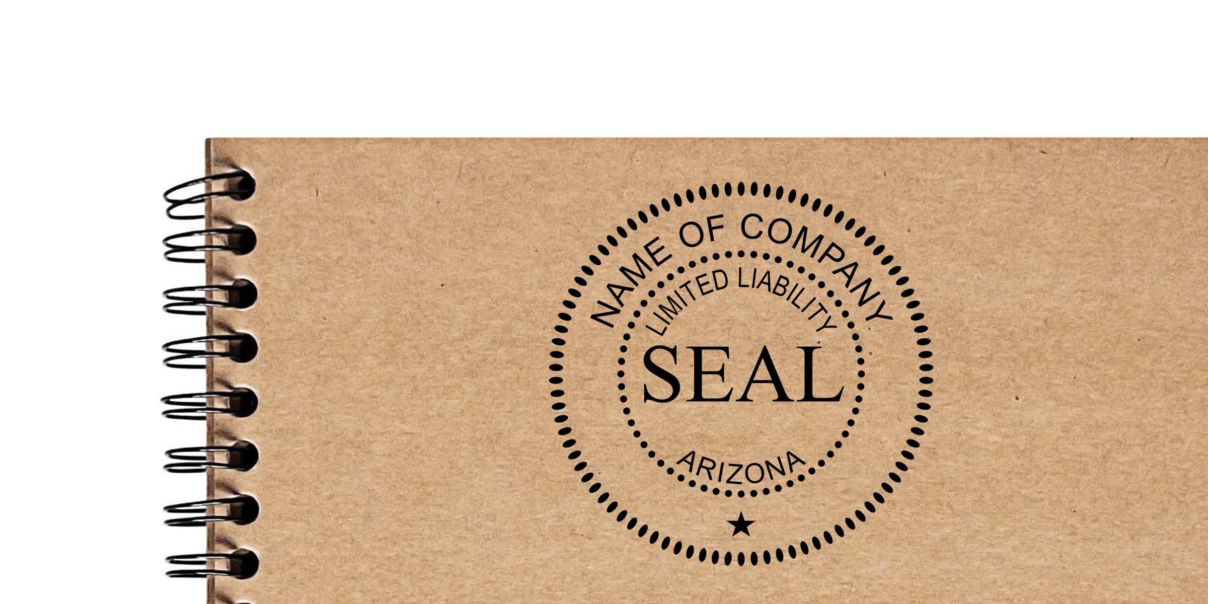 Brown kraft spiral-bound notebook cover with a black generic company seal stamp reading “Name of Company,” “Limited Liability,” “Arizona,” and “Seal”
