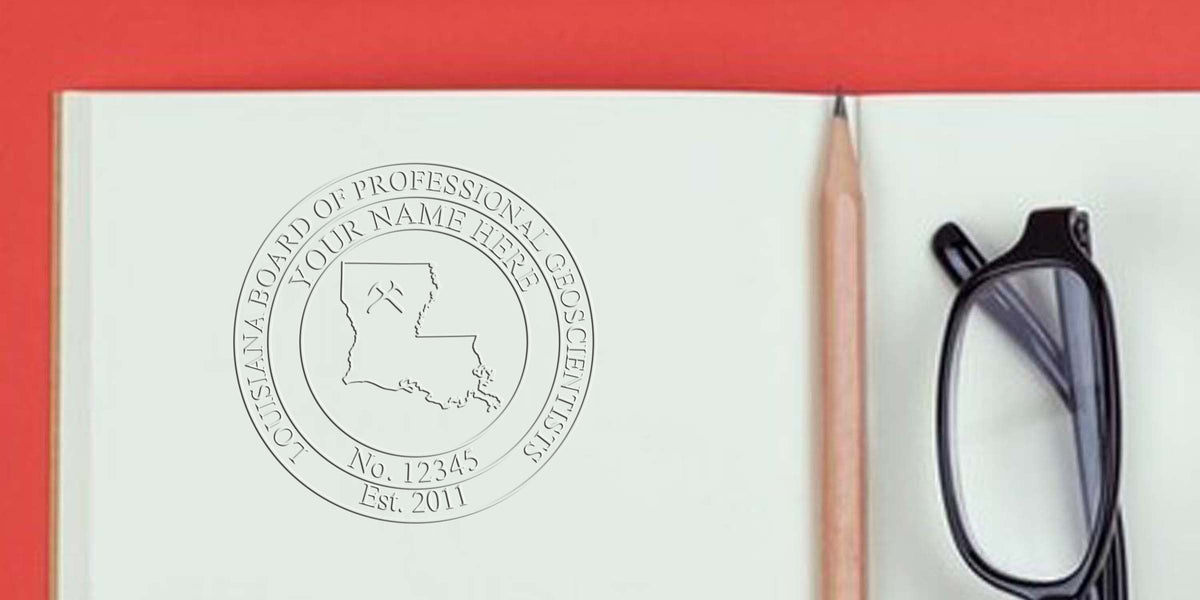 Notebook with Louisiana geologist seal embossed, pencil, eyeglasses, showing professional geoscientist certification, official license, Louisiana geoscience board logo, and geologist seal rules.