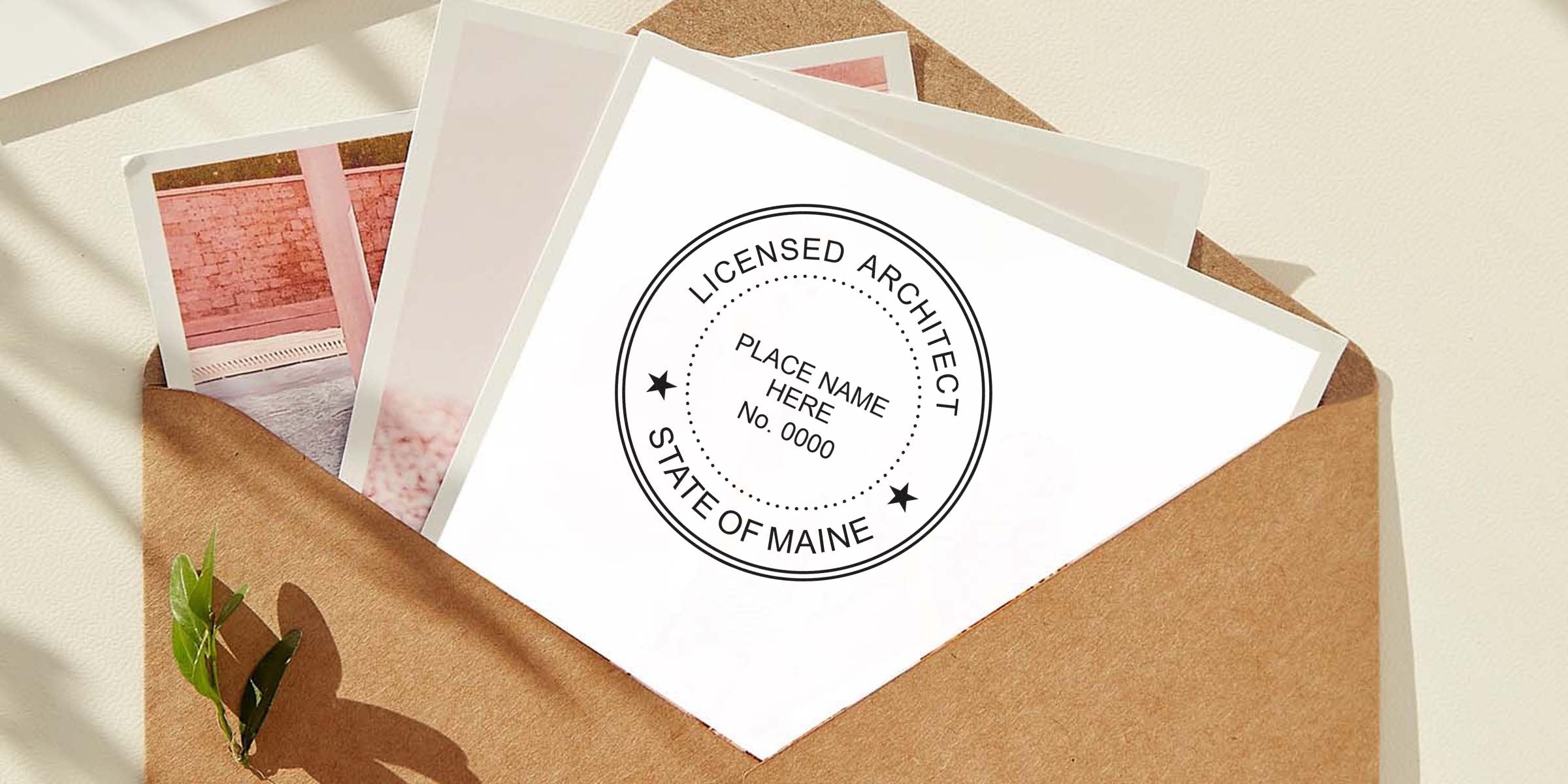 Licensed architect stamp on white paper inside brown envelope with photos, showcasing official Maine architecture seal design and meeting all Maine seal requirements.