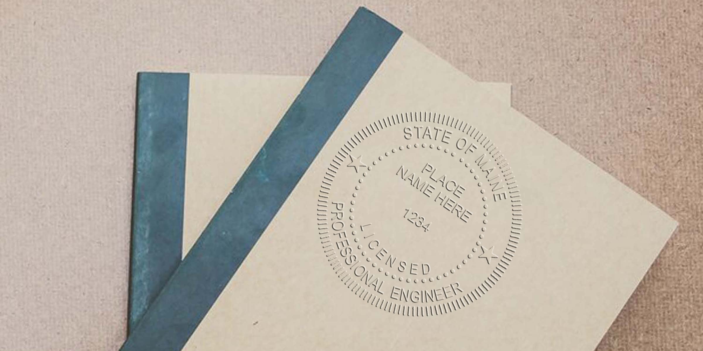 State of Maine licensed engineer embossed seal on official documents with blue binding, featuring Maine Engineering Embossers and emphasizing the challenge of earning it.