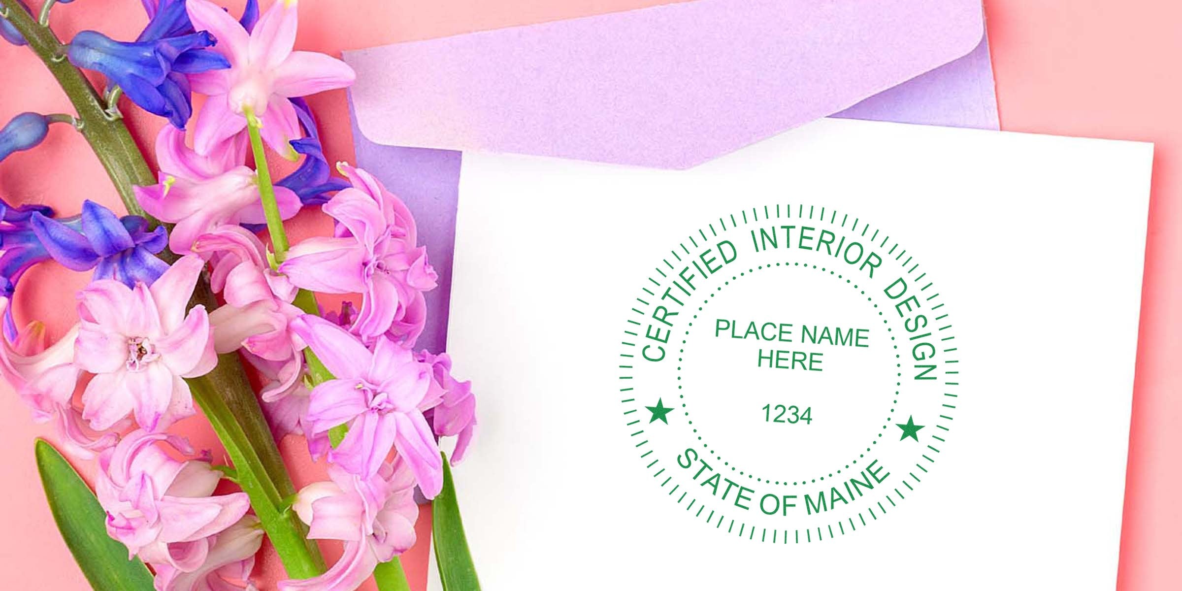 Certified Maine interior design stamp on white paper with pink and purple hyacinths and lavender envelope on pink background, adhering to seal design guidelines.