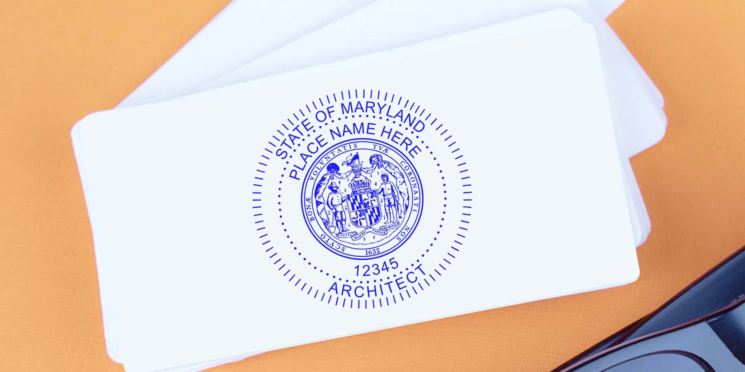 Maryland architect stamp seal on white cards with orange background and black sunglasses, meeting all architect stamp requirements.