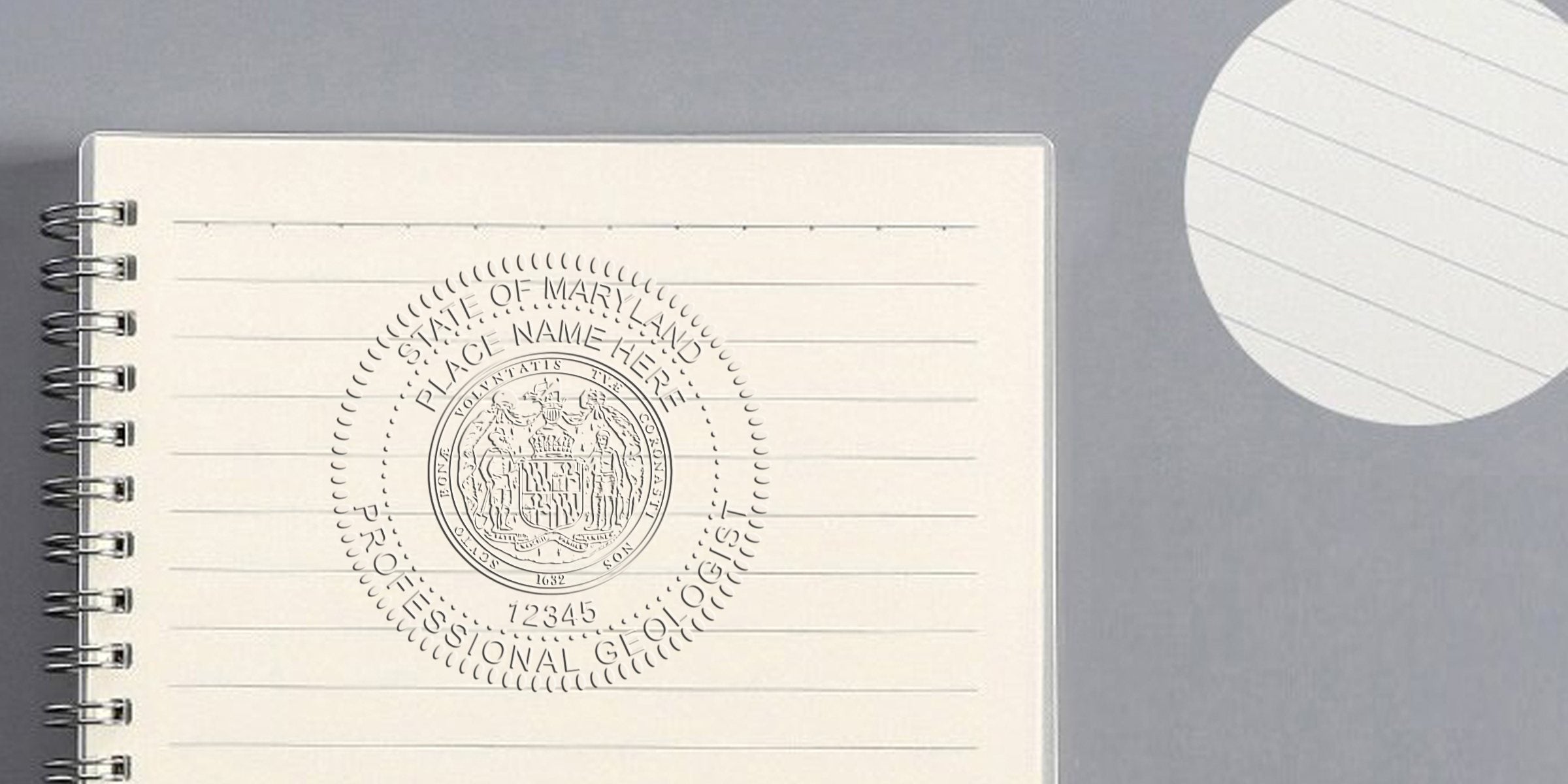Professional Maryland geologist seal stamp on lined notebook, meeting Maryland geologist size and certification requirements for license.