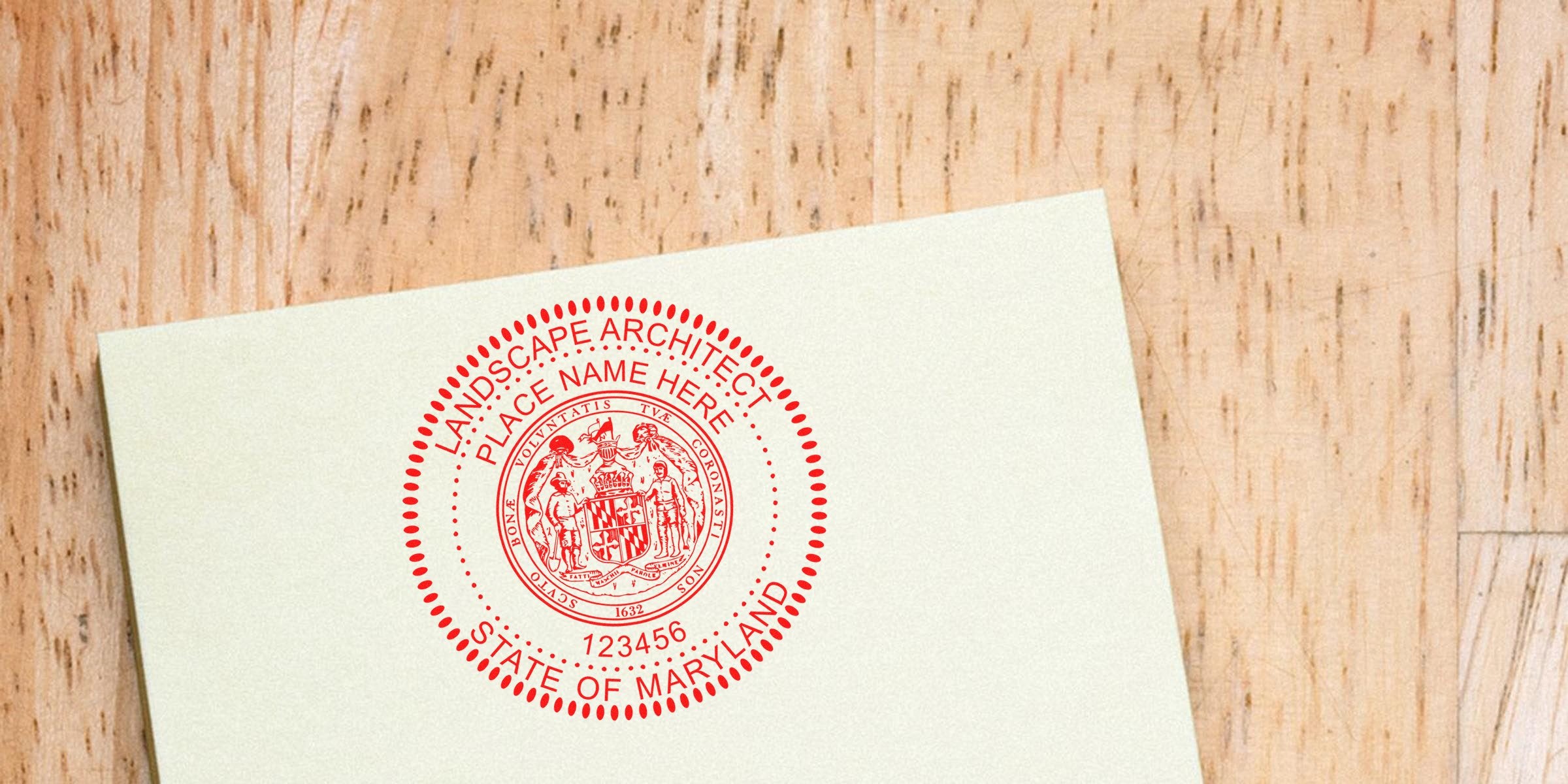 Custom Maryland landscape architect stamp on official document on wooden table.
